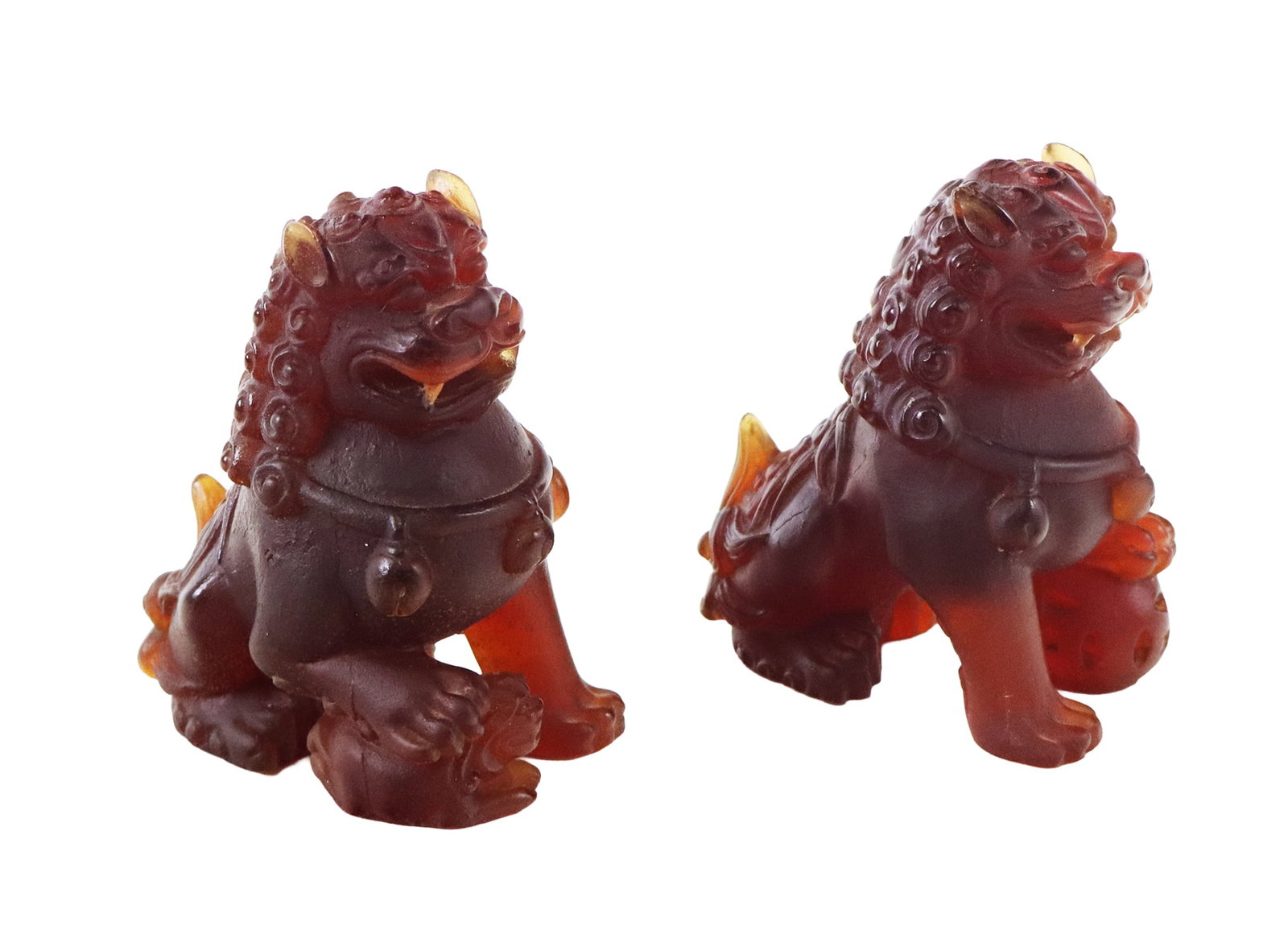 Complimentary Pair of Daum Pate de Verre Foo Dogs: Complimentary pair of Daum pate de verre foo dogs, France, 20th/21st century, including one with a ball and one with a pup both signed Daum France to bases. [4.75" H x 3" W x 4.25" D]. Condition to ea