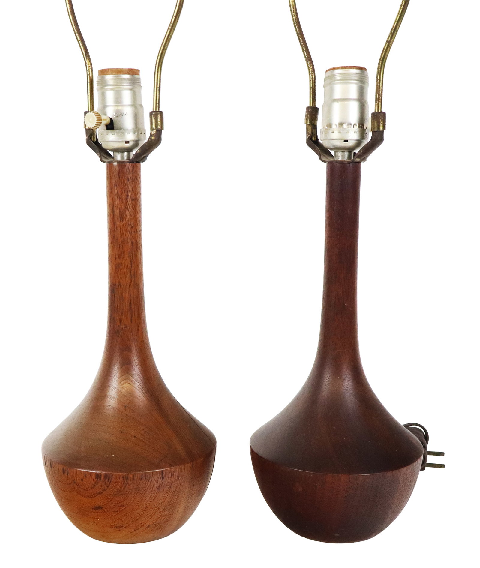 Pair of Mid-Century Modern Lamps: Pair of Mid-Century Modern lamps, likely Danish, mid-20th century, with black painted finials, and one slightly deeper in color. [23" H x 6" Diameter]. Condition is good with minor surface wear, wirin