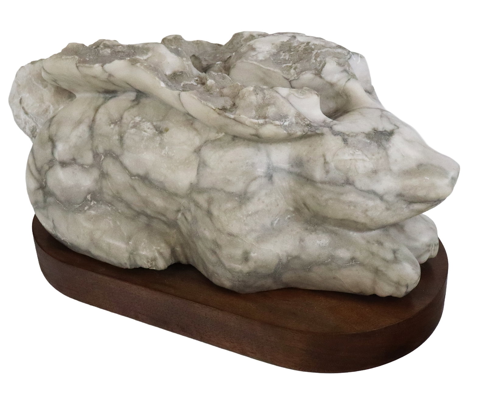 Ailene FIELDS Carved Marble Rabbit: Ailene Fields (American, b. 1948) carved marble sculpture of a rabbit, with raw edge to upper, on a wooden base, signed A. Fields to lower. [10" H x 20" W x 9.5" D]. Condition is good. From the esteem