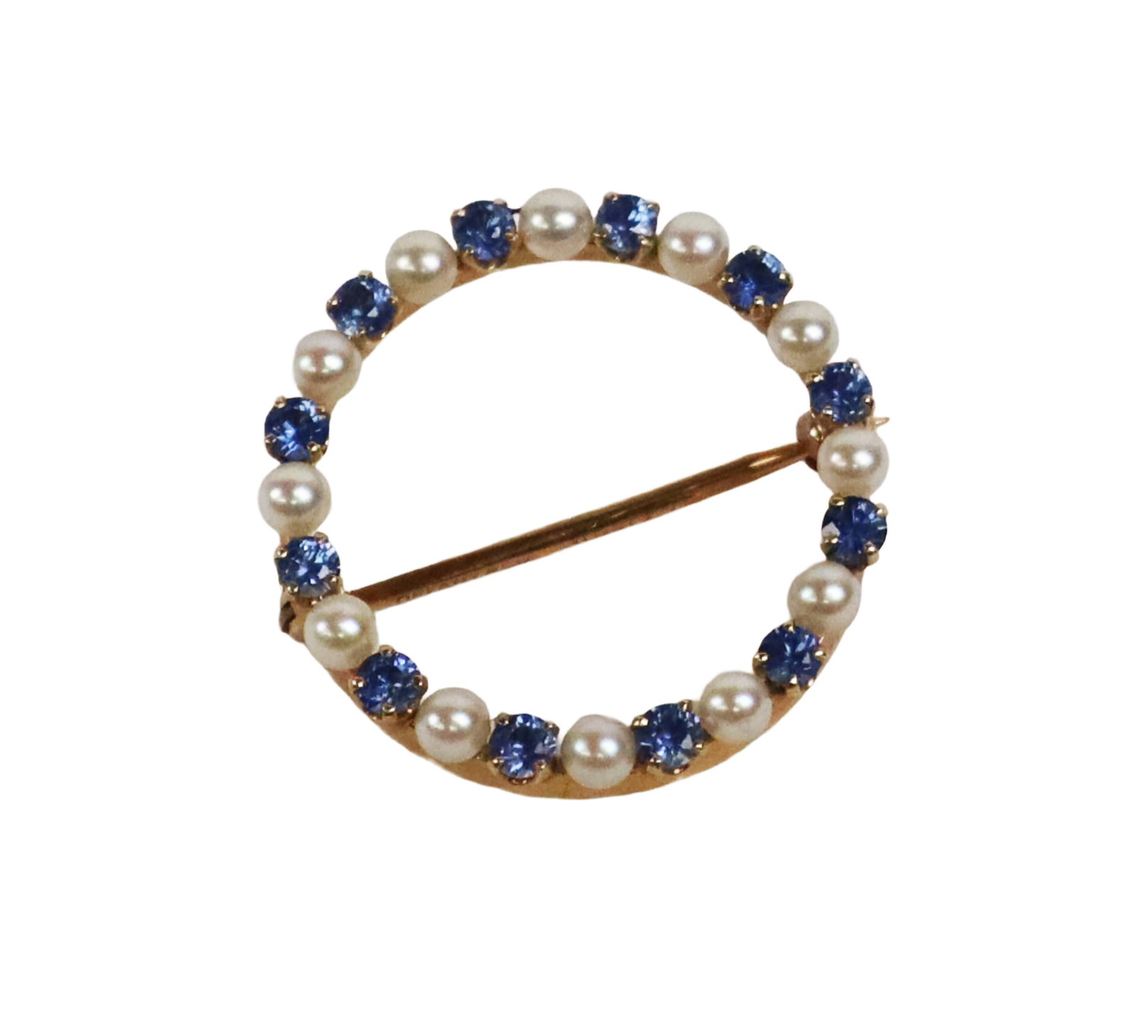 Tiffany & Co. Cultured Pearl & Sapphire Brooch: Tiffany & Co. cultured pearl, sapphire and 14K yellow gold circle brooch, mark to pin stem and scratch number to mounting. [2.21 dwt., 1" Diameter]. Overall condition is good.