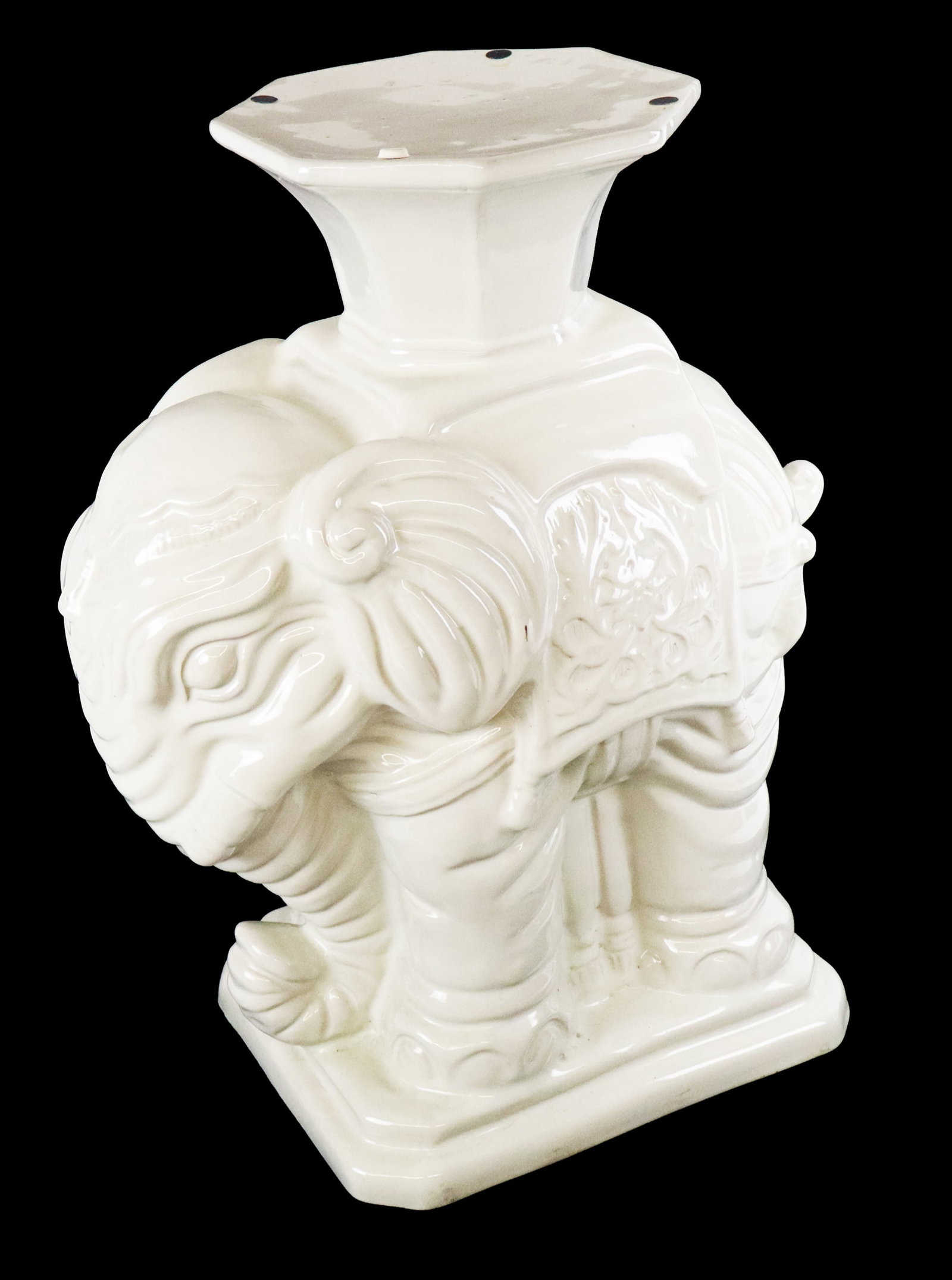 Blanc de Chine Porcelain Elephant Table Stand: Blanc de chine porcelain elephant figural table stand. [19" H x 9" W x 11" D]. Overall condition is good, top affixed with be adhesive bumpers. From the esteemed collection of Neil Zukerman former own
