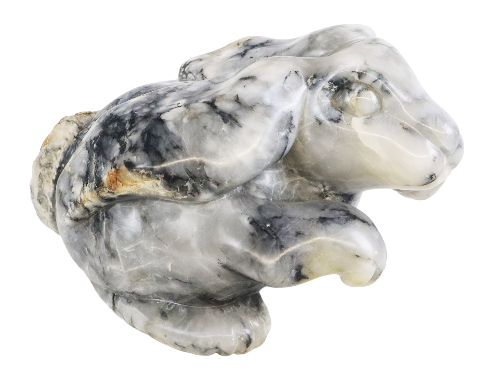 Ailene FIELDS Carved and Polished Marble Rabbit: Ailene Fields (American, b. 1948) carved and polished marble sculpture of a rabbit with raw detail to tail. [9" H x 16" W x 12" D]. Condition is good. From the esteemed collection of Neil Zukerman for