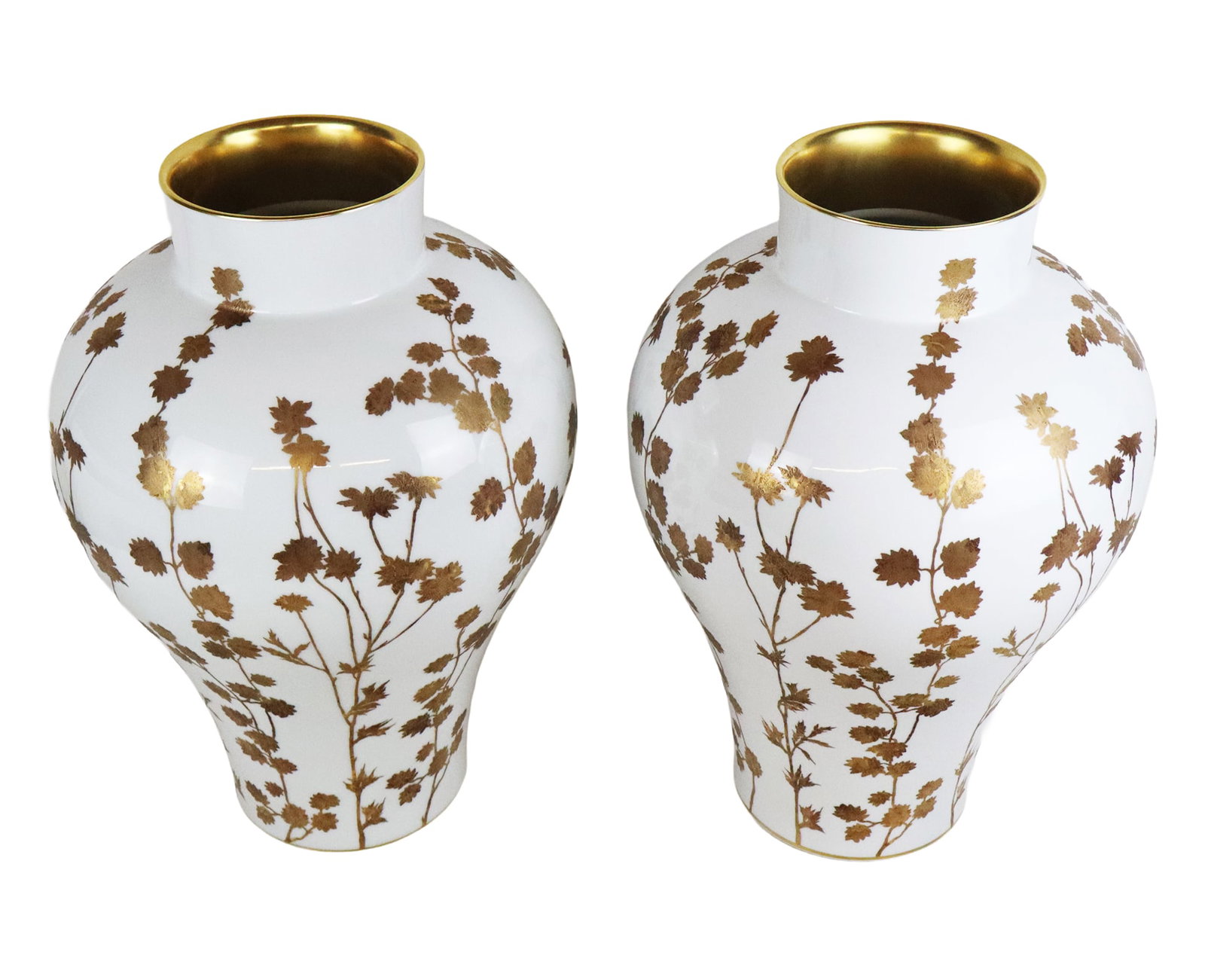 Bernadaud Anthemis Pair of Gilt Decorated Vases: Bernadaud Anthemis vases, France, 21st century, with gilt decorated foliate design, and comprising on editioned 141/250, and the other 49/250, each marked to bases. [21" H x 14" Diameter]. Condition t