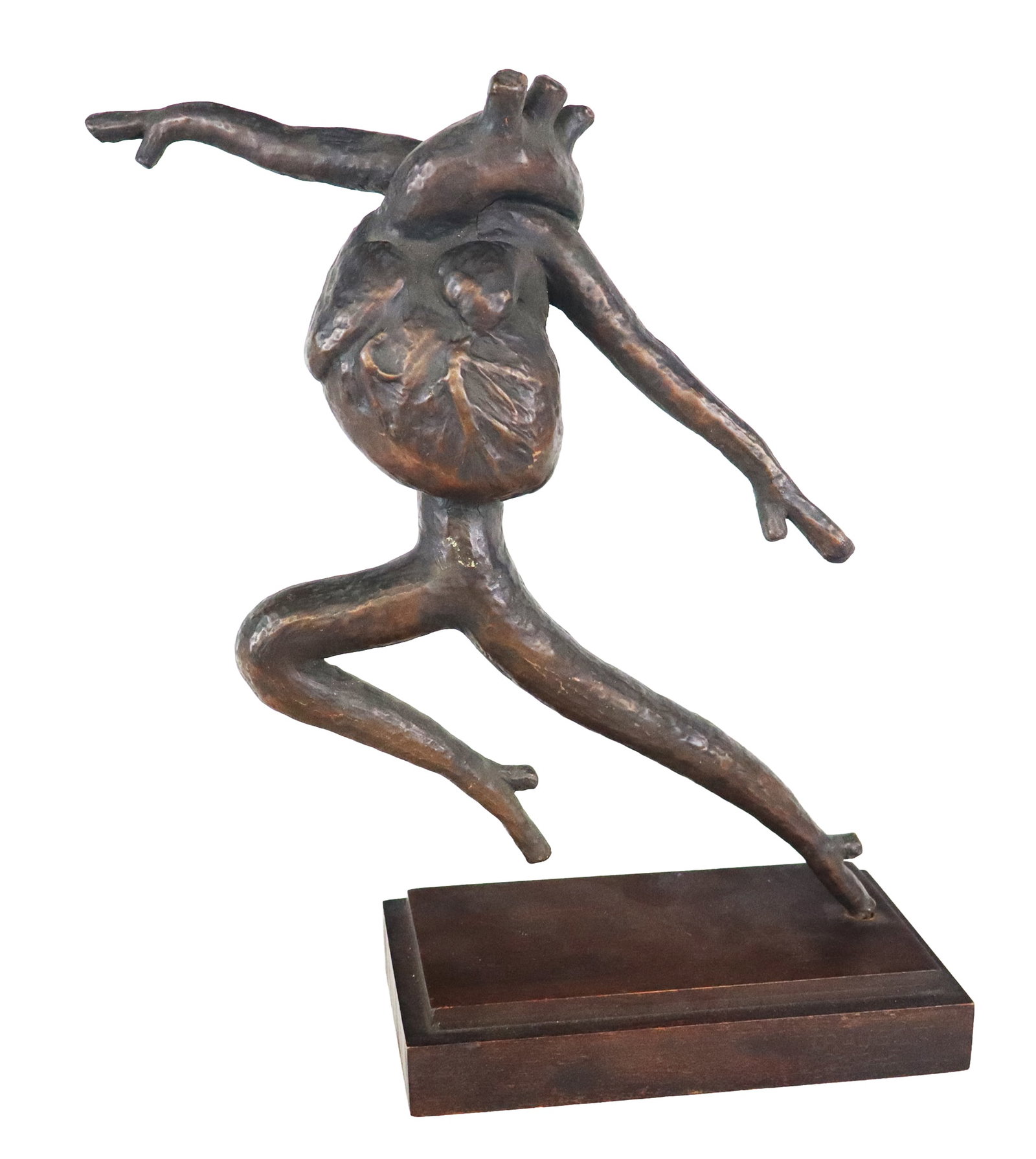 Traugott Signed Bronzed Sculpture of a Heart: Bronzed sculpture of a dancing heart, 1945, signed Traugott to wood base, with date. [17.5" H x 15" W x 5.5" D]. Condition is good with some surface wear.