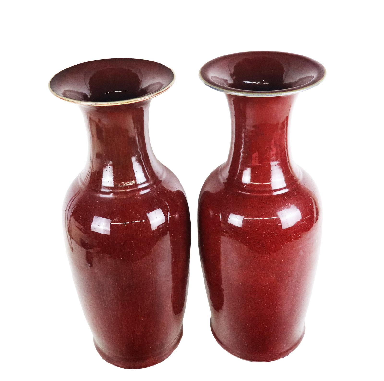Two Chinese Sang de Beouf Baluster Urns: Two Chinese sang de beouf baluster urns, 20th century, with textured glaze, unmarked. [22.5" H x 10" Diameter]. Condition to each is good.