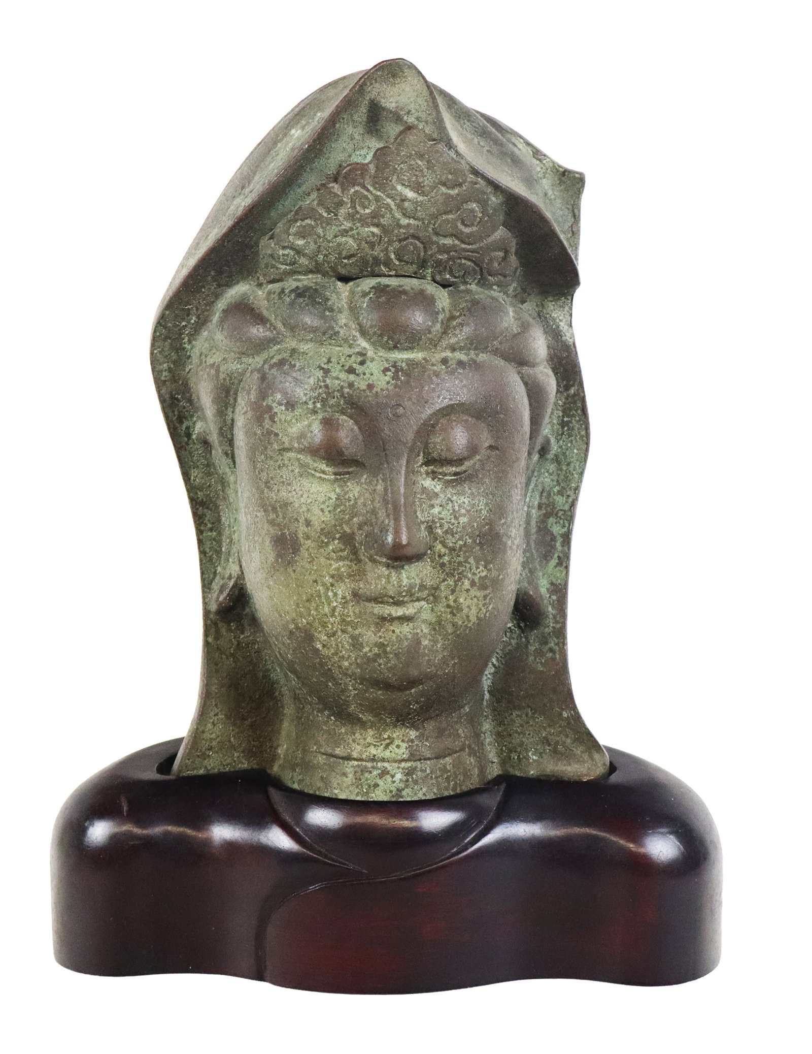Bronze Head of Buddha on a Stand: Bronze head of Buddha, 20th century, on a carved wood stand. [Including stand: 13" H x 9" W x 5" D]. Condition is good with simulated verdigris.