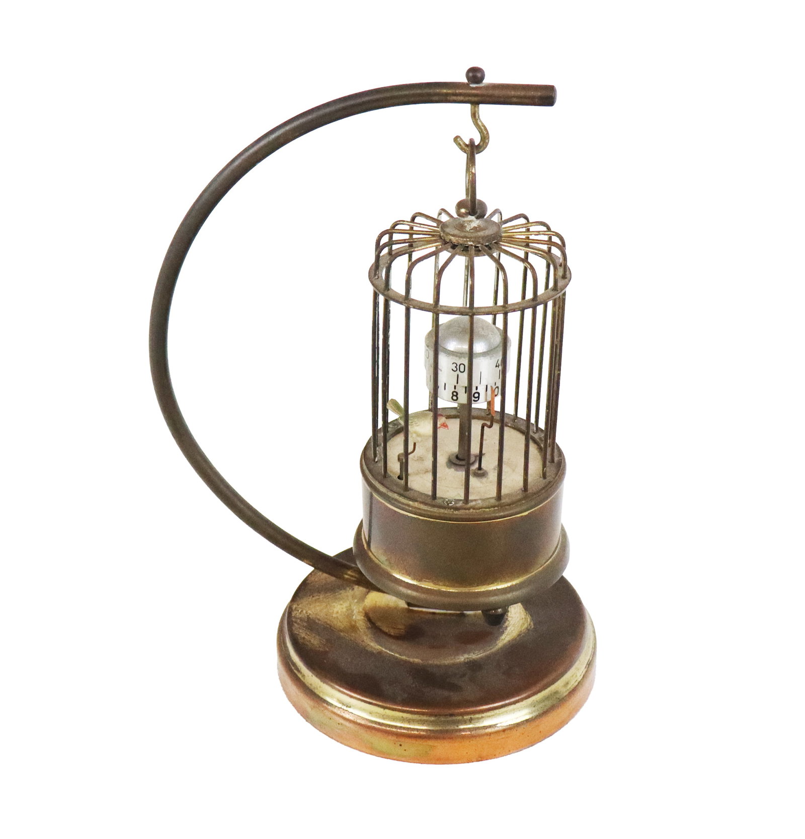 J. Kaiser Birdcage Clock: J. Kalser GMBH birdcage clock, 20th century, with a clock to interior and automated bird, suspended on a brass stand, marked to base of birdcage. [8.5" H x 6" W x 4.5" D]. Condition is good with patin