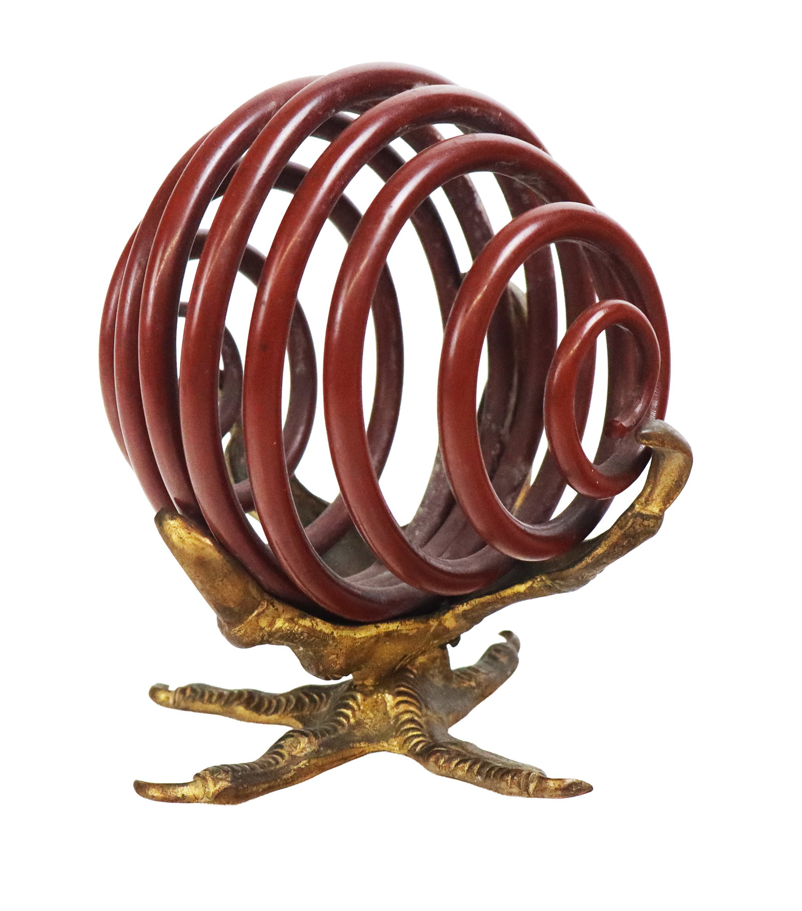 Art Nouveau Bronze and Metal Letter Stand: Art nouveau bronze and painted red metal whimsical stand, probably first quarter of the 20th century, designed as a gilt bronze talon clutching a red painted metal coil. [5.25" H x 4.5" Diameter]. Ove