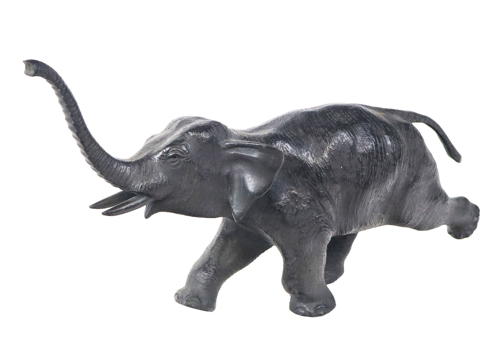 Bronze Sculpture of an Elephant: Bronze sculpture of an elephant, 20th century, possibly Japanese, unmarked. [7.5" H x 12" W x 4.5' D]. Condition is good.