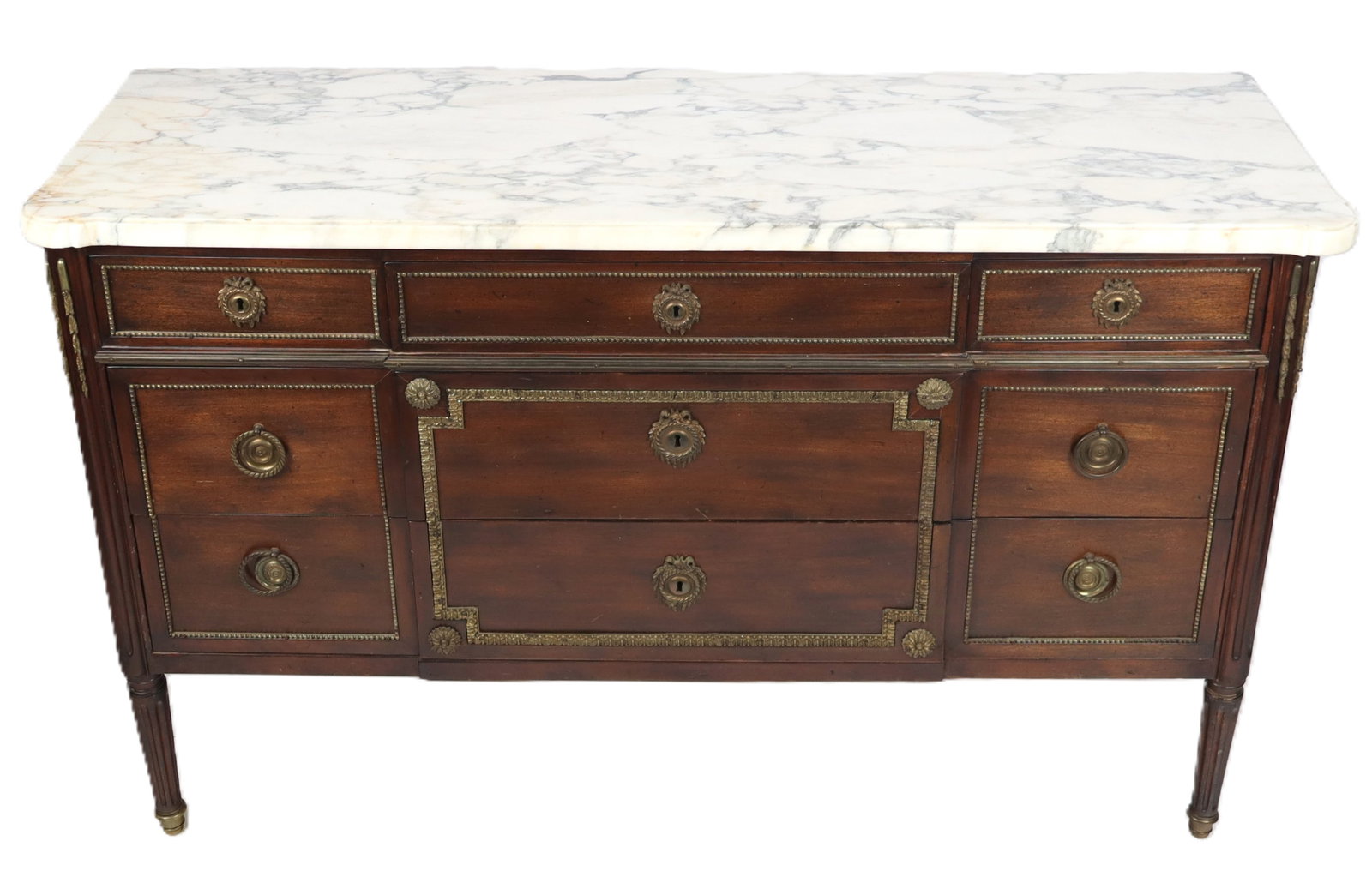 Louis XVI Marble Top Commode: Louis XV marble top commode, later 19th century, with three short over two long drawers, mounted in bronze dore, and with flatware organizer to upper drawers. [33" H x 54" W x 13.5" D]. Condition is g