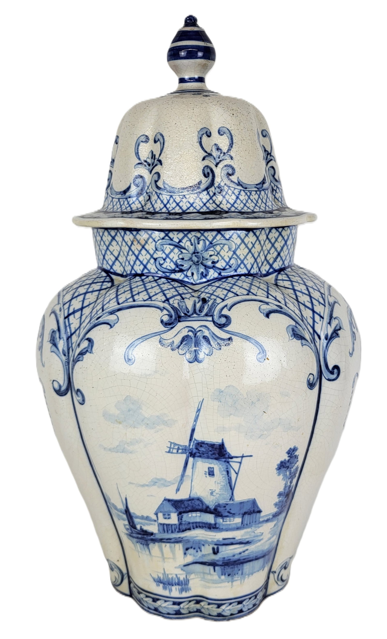 Delft Faience Porcelain Ginger Jar: Delft porcelain ginger jar, 20th century, with hand painted decoration, marked to base. [24" H x 14" Diameter]. Condition is good with crazing.