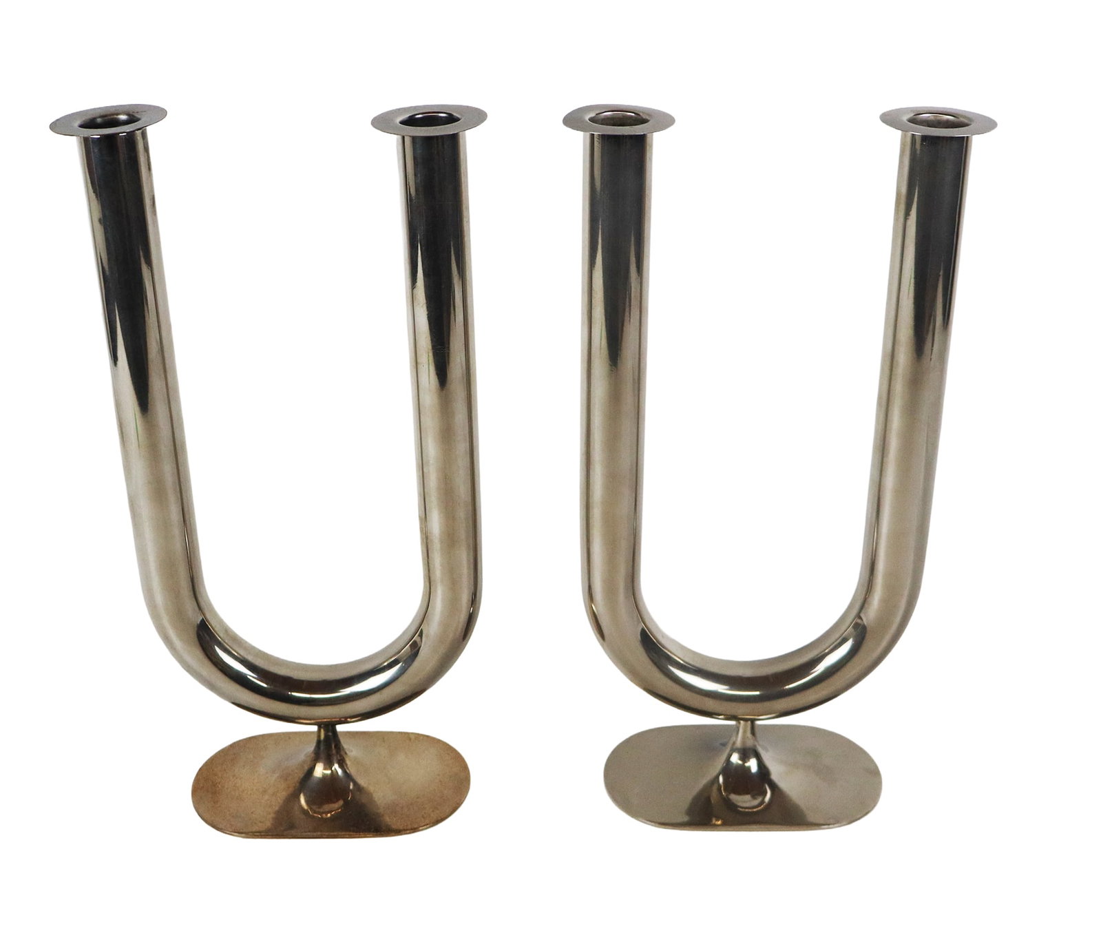 Hagenauer Pair of Silver Plate Candelabra: Hagenauer pair of art deco-inspired silver plate candelabra, Austrian, probably mid-century modern, of simple and exaggerated U form with removable bobeches, marks to base. [13.25" H x 6.5" W x 3.25" 