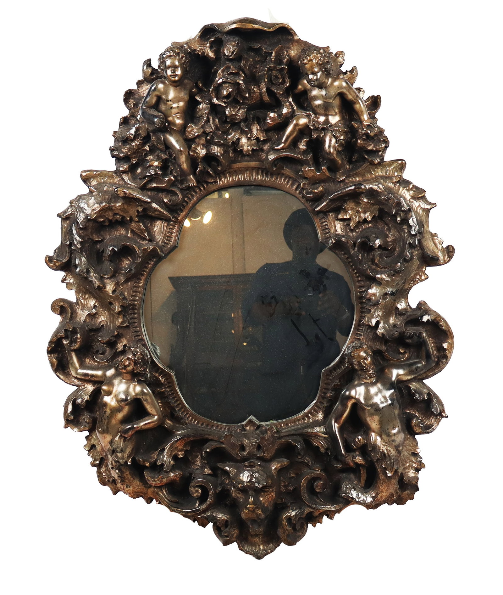 Finesse Originals Fiberglass Mirror with Cherubs: Finesse Originals fiberglass mirror, circa 1970s, with cherub decoration in deep relief, marked Finesse Originals to upper. [48" H x 36" W x 7" D]. Condition is good. From the esteemed collection of N