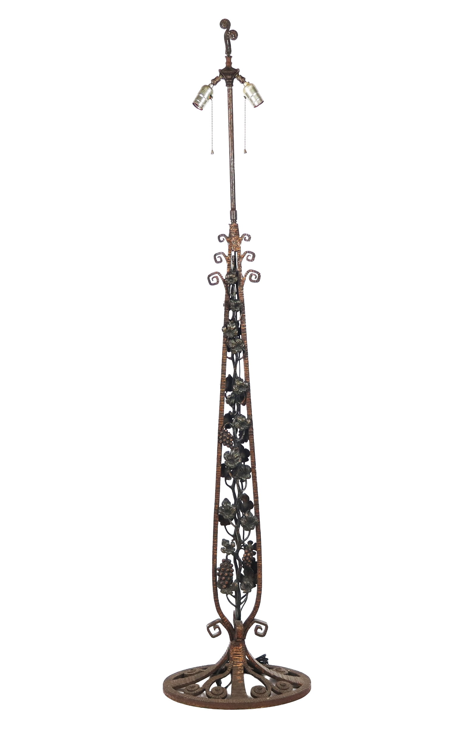 Aesthetic Movement Iron Floor Lamp: Aesthetic movement iron floor lamp, early 20th century, with foliate and grape decoration and a decorative finial. [69" H x 17" W x 10" D]. Condition is good, rewired, wiring untested.
