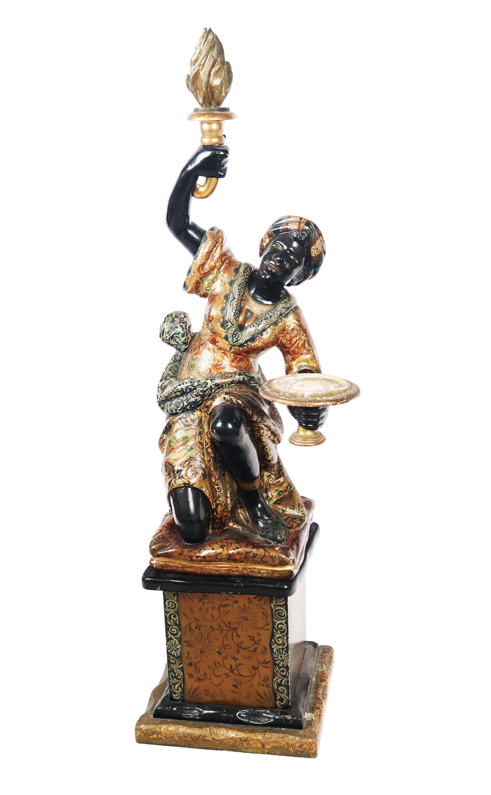 Venetian Style Carved Blackamoor Figure: Carved figure of a blackamoor, 20th century, in the Venetian style, holding a lamp in one hand and table support in another. [64" H x 22" W x 17" D]. Condition is good with some surface wear, table po