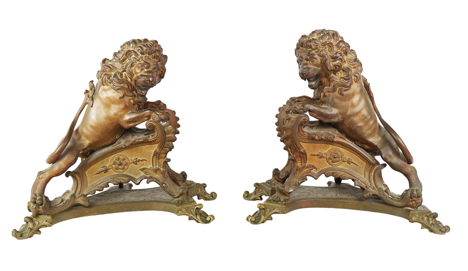 Pair of Louis XV Bronze Dore Lion Chenets: Pair of Louis XVI bronze dore chenets, 19th century, apparently unmarked. [15" H x 16" W x 7" D]. Condition to each is good with patina, chenets only.