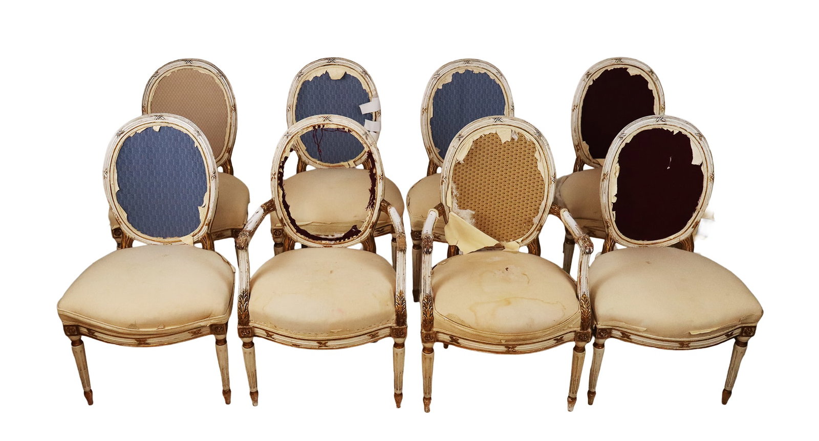 Eight Louis XVI Side Chairs: Eight Louis XVI side chairs, 20th century, with carved, gilt decorated, and white-painted frames and upholstered seats and backrests. [40" H x 23" W x 21" D; seat height: 19"]. Condition is fair with 