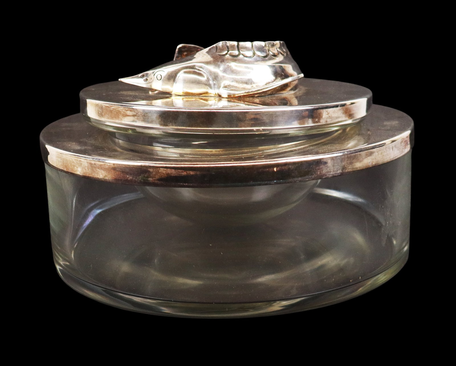 Silver Plate and Glass Caviar Bowl: Silver plate and glass caviar bowl with coiled fish finial, mark to interior top. [5.5" H x 9" Diameter]. Overall condition is good.