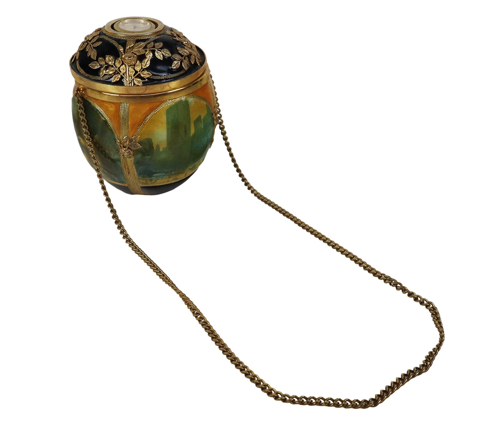 Gilt Metal and Decoupage Egg Purse: Gilt metal and decoupage egg purse, 20th century, with scenes of New York City and a clock to lid, velvet lined interior. [Less chain: 8" H x 6" Diameter]. Condition is good; clock untested.