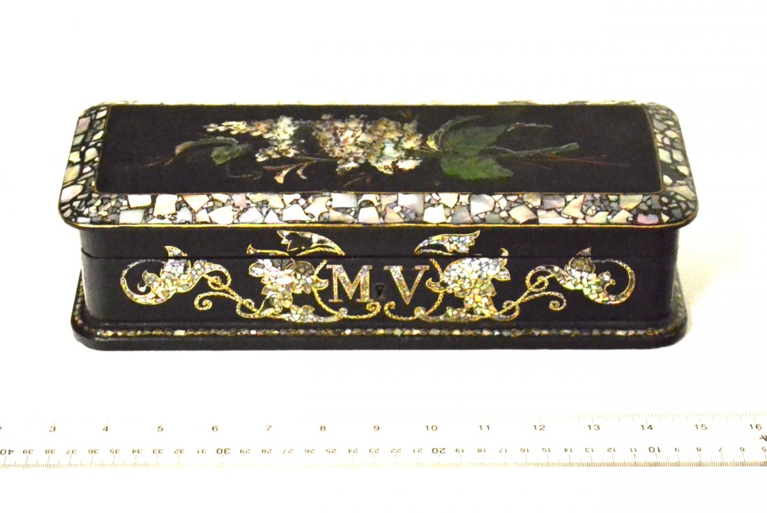 Mother-Of-Pearl Black Lacquered Box: Victorian black lacquered and mother-of-pearl inlaid casket, tufted interior. [4 3/4" x 12" x 3" H]