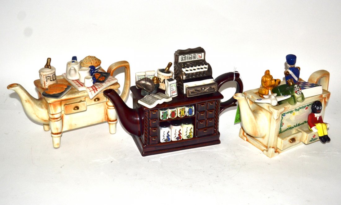 Three Teapots, Cardew Design: A cash register, chest of drawers and table form teapots. "Cardew Design.' In good condition.