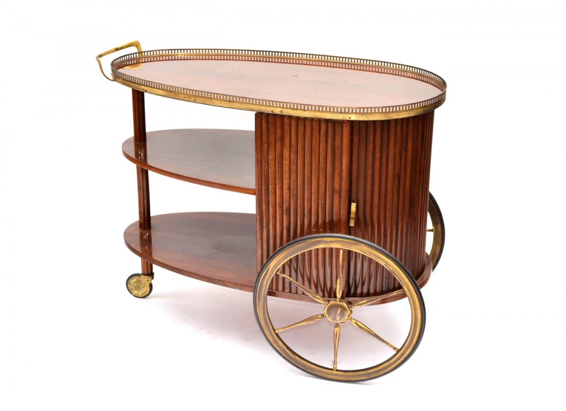 Modern Tambour Service Cart: Egg form, three tier service cart. Tambour slide revealing bar storage. Reticulated gallery. [35 1/4" x 17 3/4" x 28" H].