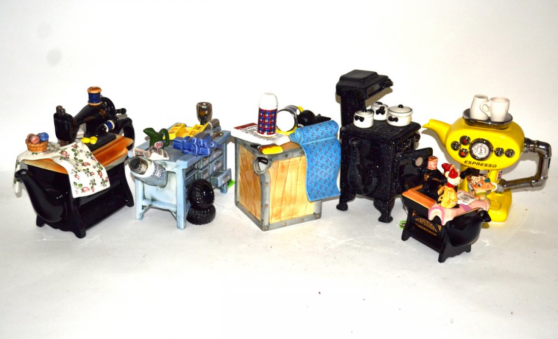 Six English Teapots: Espresso machine, Disney, paint box, black stove, tool chest, and sewing machine form teapots
