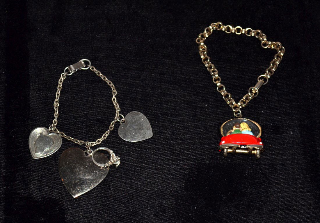 2 Charm Bracelets: Two charm bracelets "Love in the Car" and "Engagement"