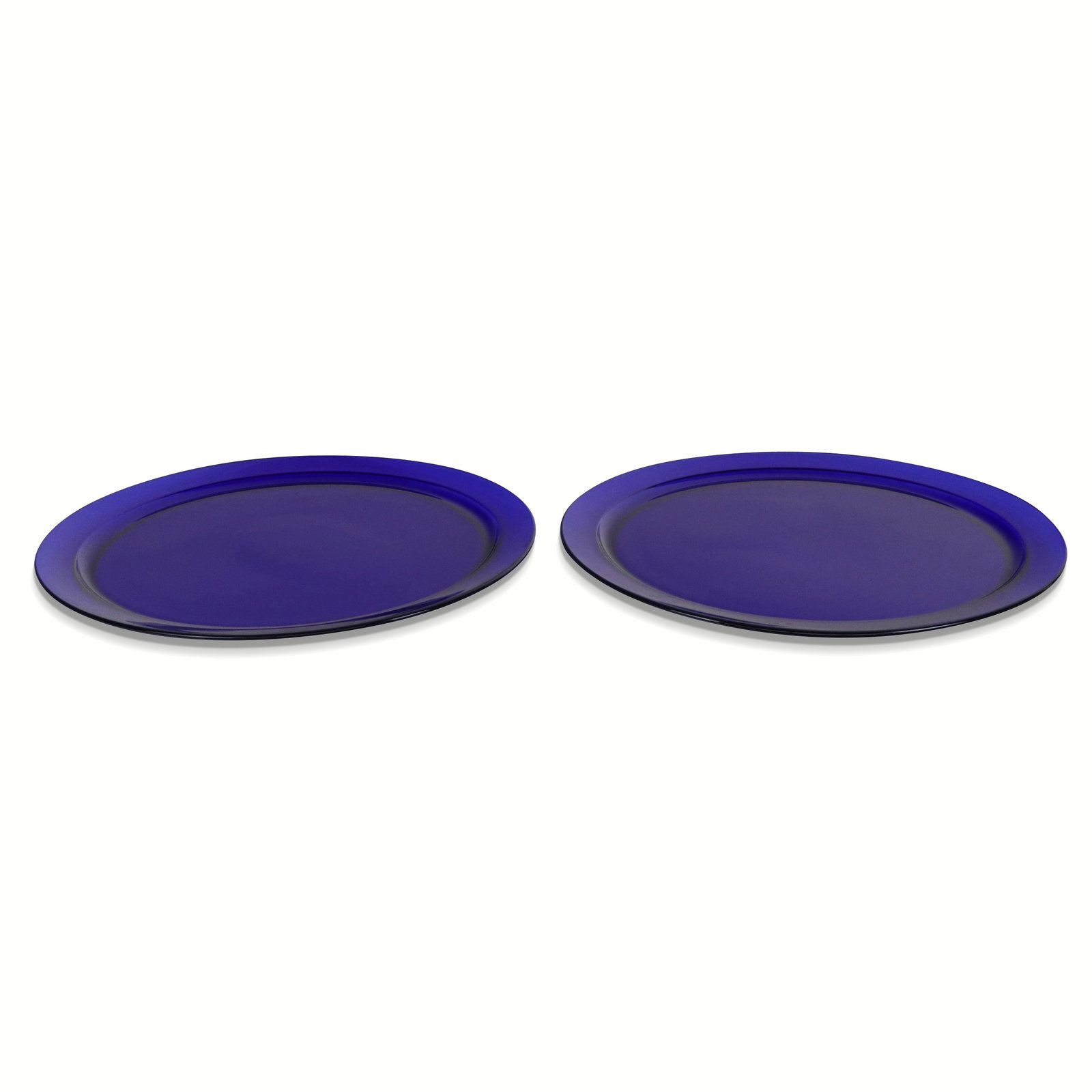 Pair of Cobalt Blue Glass Charges: Pair of cobalt blue glass chargers, 20th century, unmarked. [14" Diameter]. Condition to each is good with some surface wear.