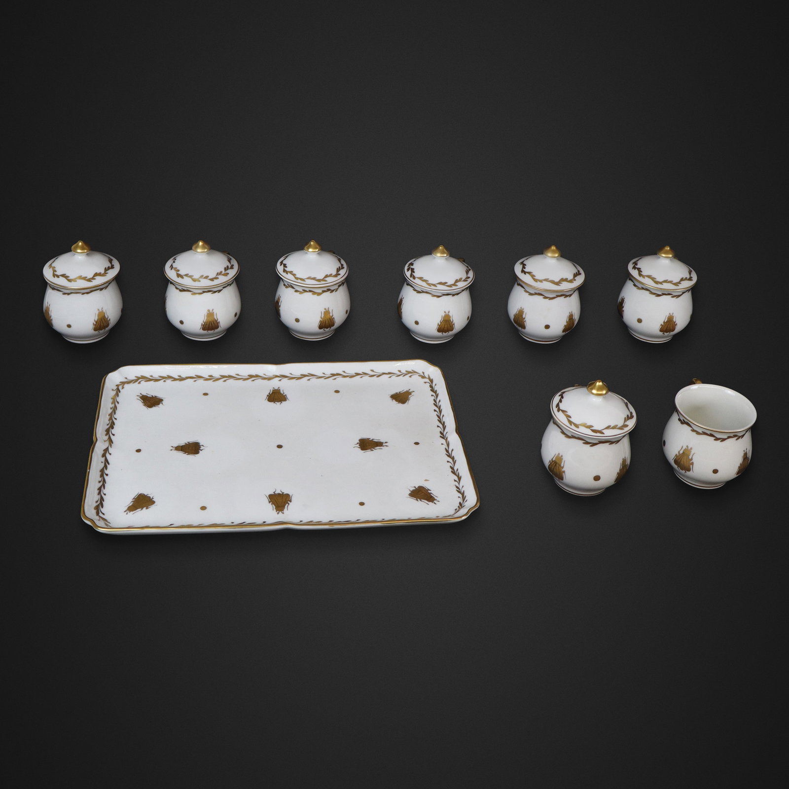 8 BH Porcelaine de Vincennes Pot de Cremes & Tray: BH Porcelaine de Vincennes set of eight pot de cremes, 20th century, Limoges, accompanied by a tray, all with gilt decoration, all marked to bases. [Pot de creme: 3.5" H x 4" W x 3" D; tray: 8" H x 10