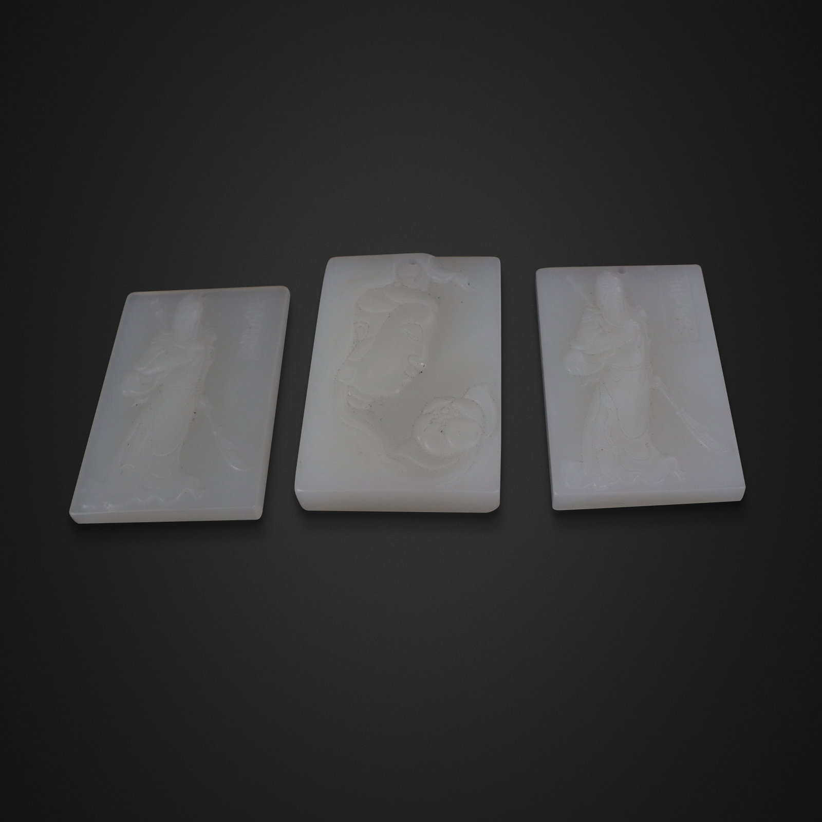 Three White Jade Pendants Carved in Relief (1 of 9)