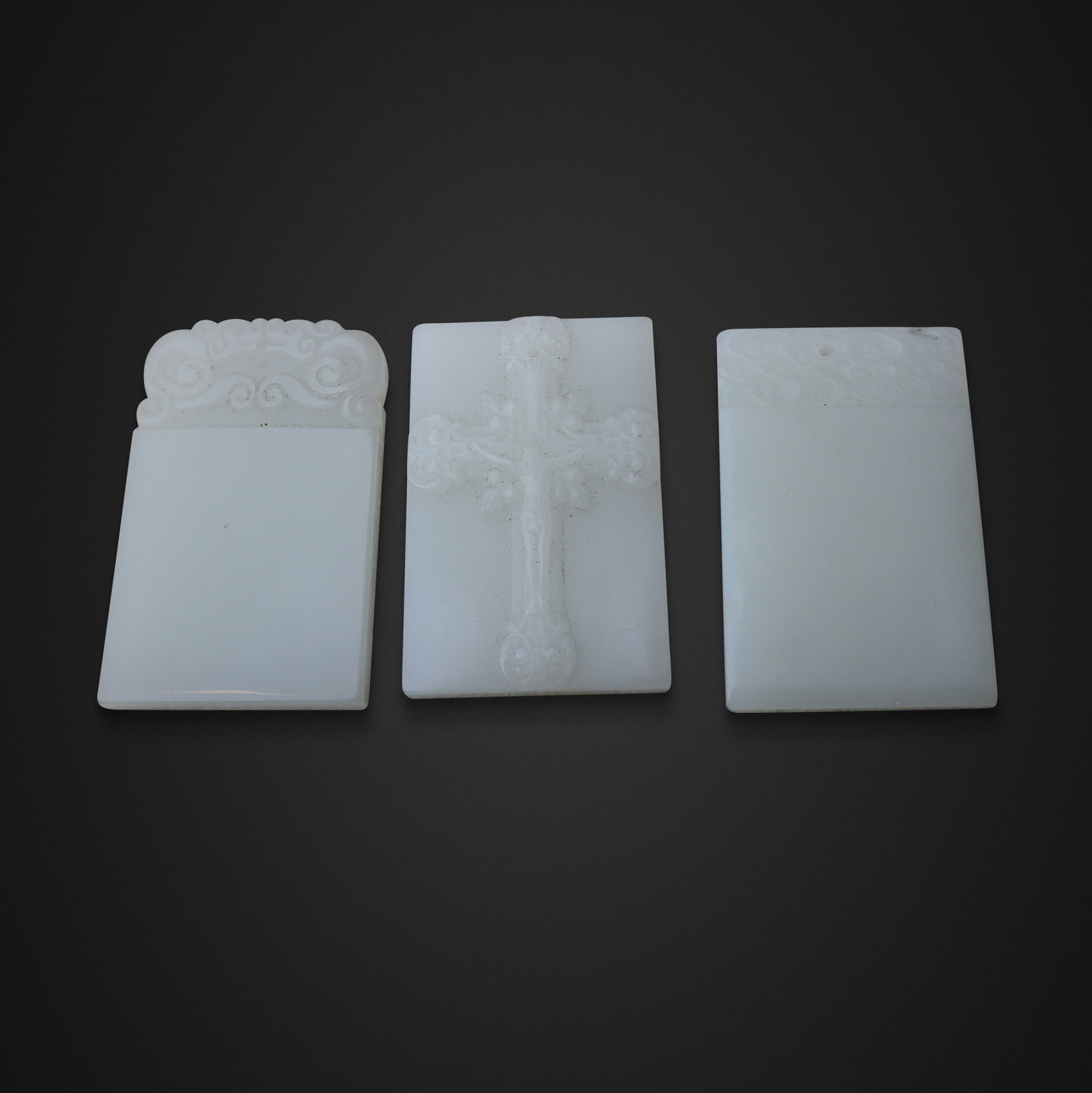 Three Carved White Jade Pendants (1 of 6)