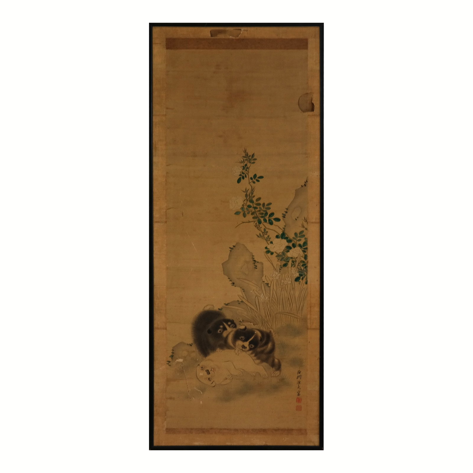 Japanese Ink on Silk with Dogs: Japanese ink on silk with dogs, 19th century, inscribed lower right with seals, in a frame. [Framed: 53" H x 20.5" W]. Condition is fair with losses to work at upper right and lower left, discoloratio