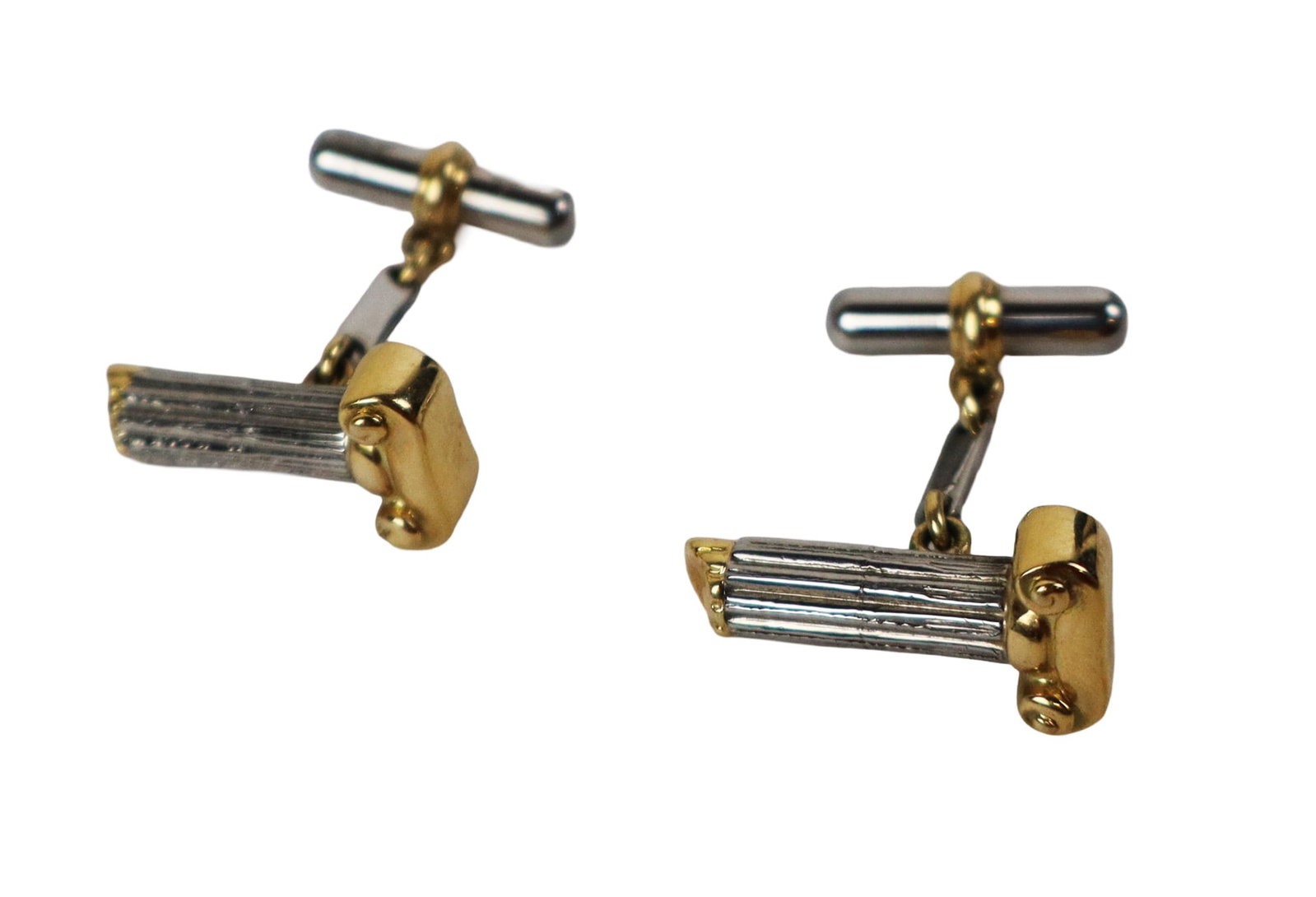 Pair of Gold and Silver Ionic Column Cufflinks: Pair of 18K gold and 925 silver iconic column cufflinks, marked M 750 925 AG. [Total 8.1 dwt.]. Overall condition is good. Property from the family of Leonard Bernstein.