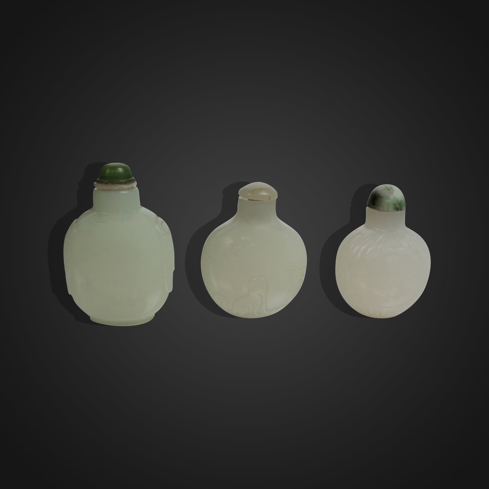 Three Carved Jade Snuff Bottles (1 of 11)