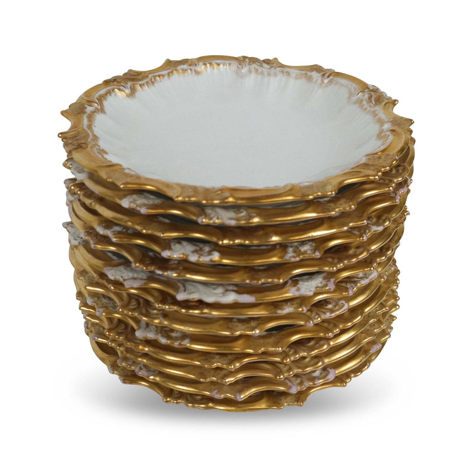 Tressemanes & Vogt Gilt Decorated Plates, 13: Tressemanes & Vogt for Davis Collamore & Co. Ltd. gilt decorated shallow bowls with shaped borders, marks to reverse. [9.25" Diameter]. Overall condition is good/fair, losses to gilding and some with 
