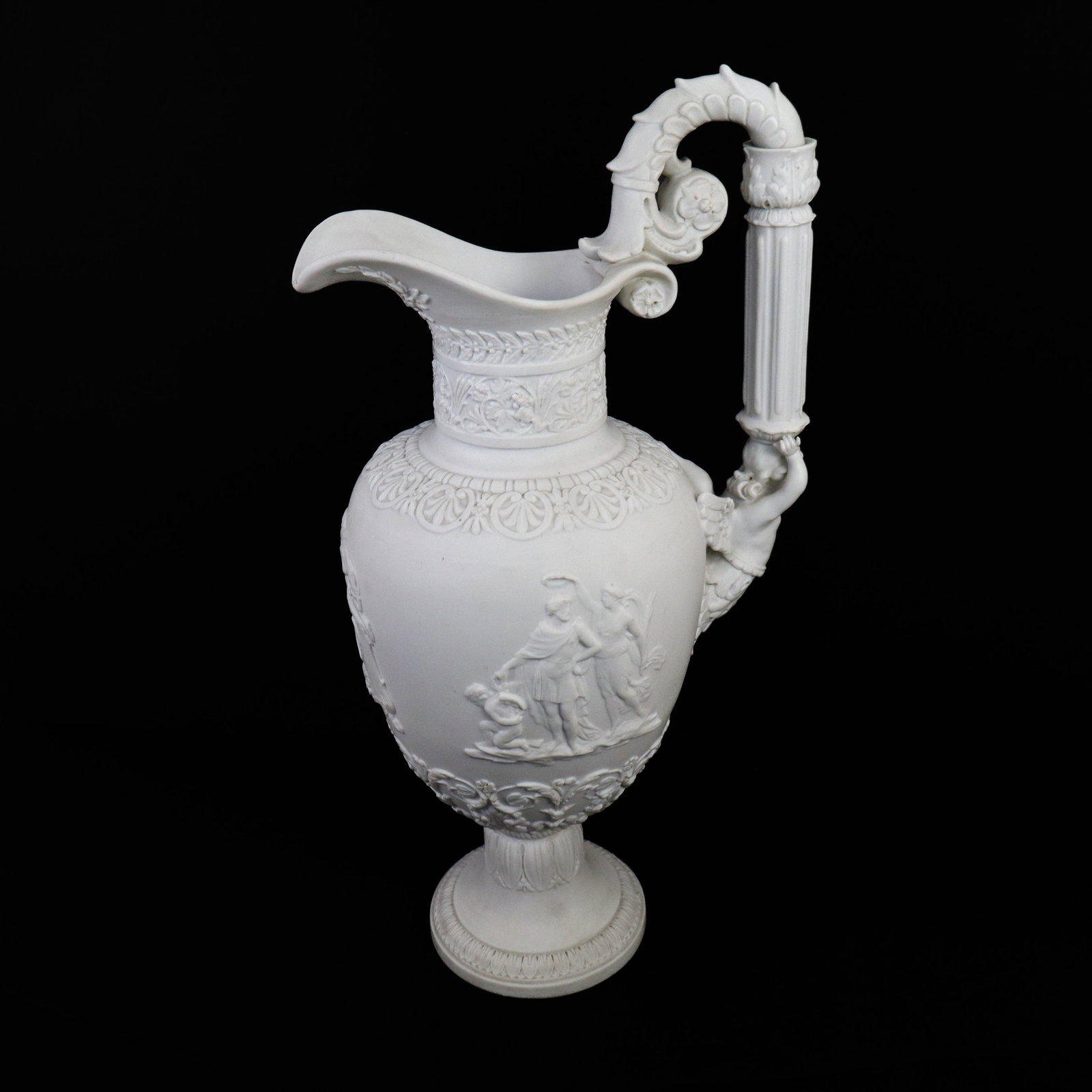 Neoclassical Parian Ewer: Neoclassical modeled Parian ewer, probably late 19th century, in two sections, elaborately decorated with allegorical scenes, centering and beneath the spout a lion with putto on a raised chest "Love
