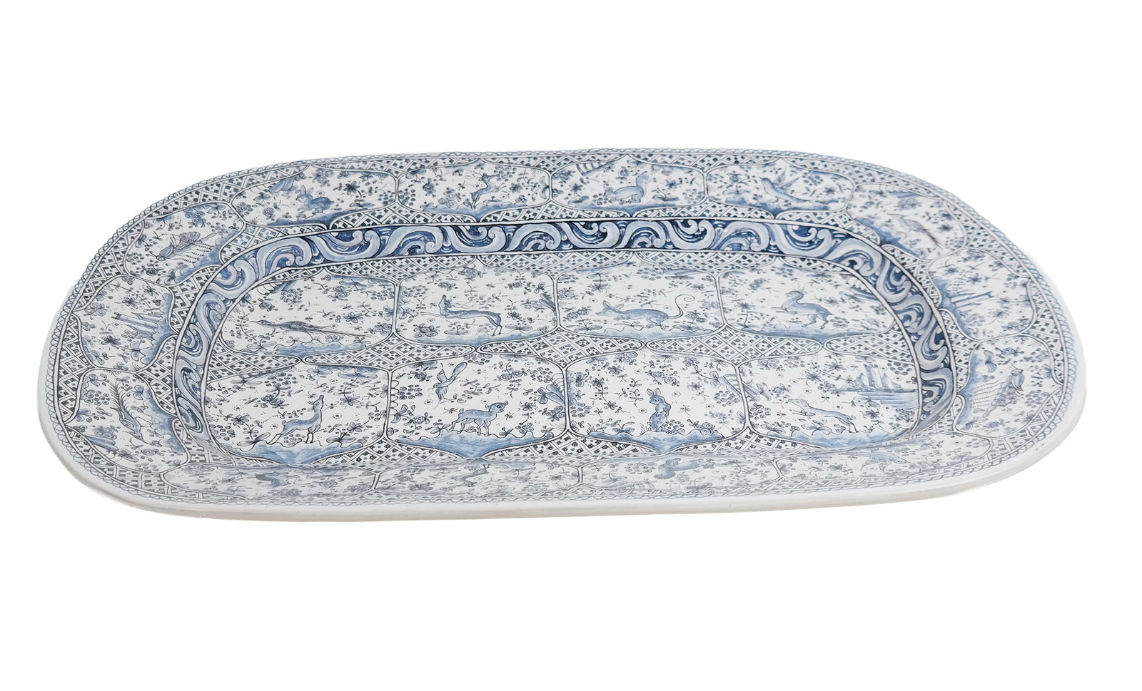 Meiselman Imports Ceramic Charger: Meiselman Imports Cecilia 3 pattern blue and white 17th century decorated charger, Portuguese, late 20th century, marks be base. [2.5" H x 23" L x 16" W]. Overall condition is good.