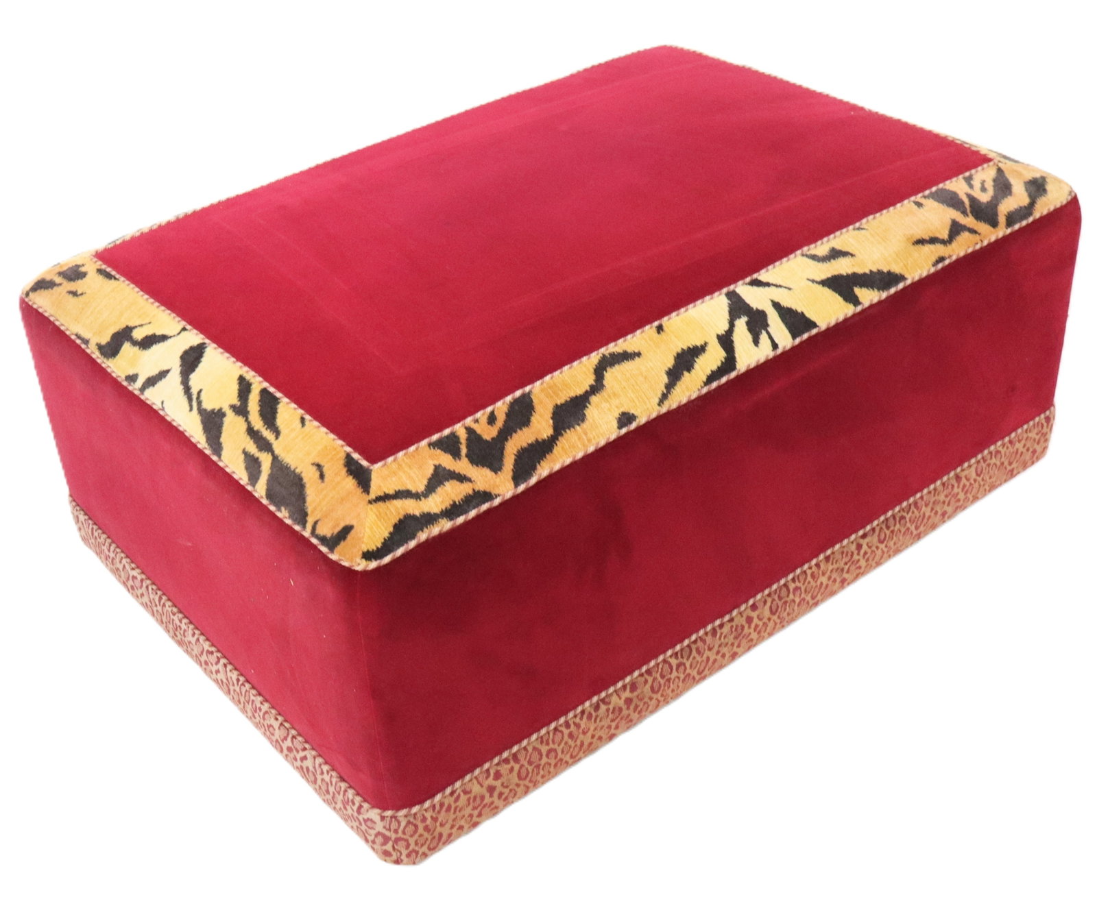 Cheetah Print and Velvet Upholstered Ottoman: Cheetah print and velvet upholstered ottoman, 20th/21st century, on four short feet. [17" H x 40" W x 27" D]. Condition is good with some fading to upholstery.