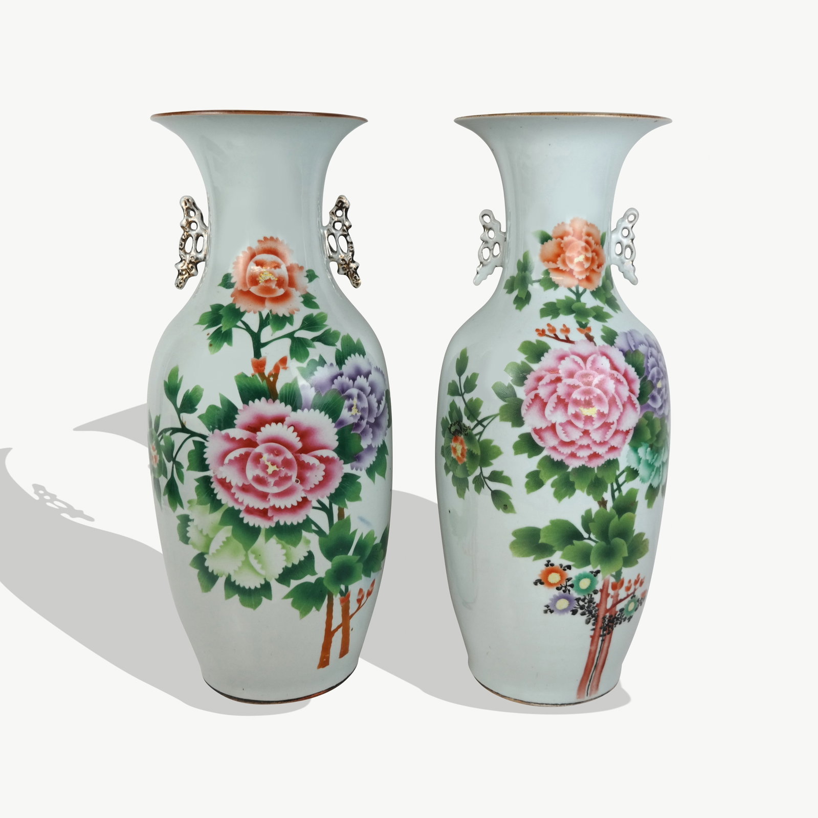 Pair of Chinese Export Urns: Pair of Chinese Export baluster urns, 20th century, with hand-painted floral decoration and inscription, unmarked at base. [22.5" H x 8.5" Diameter]. Condition is good with minor wear.