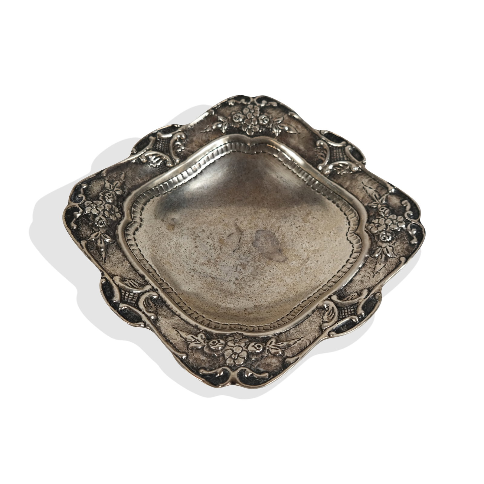 Sterling Silver Shallow Dish: Sterling silver footed shallow dish, with repousse rosebuds, mark to center [7 ozt., 2" H x 8.25" Square]. Overall condition is good, tarnished