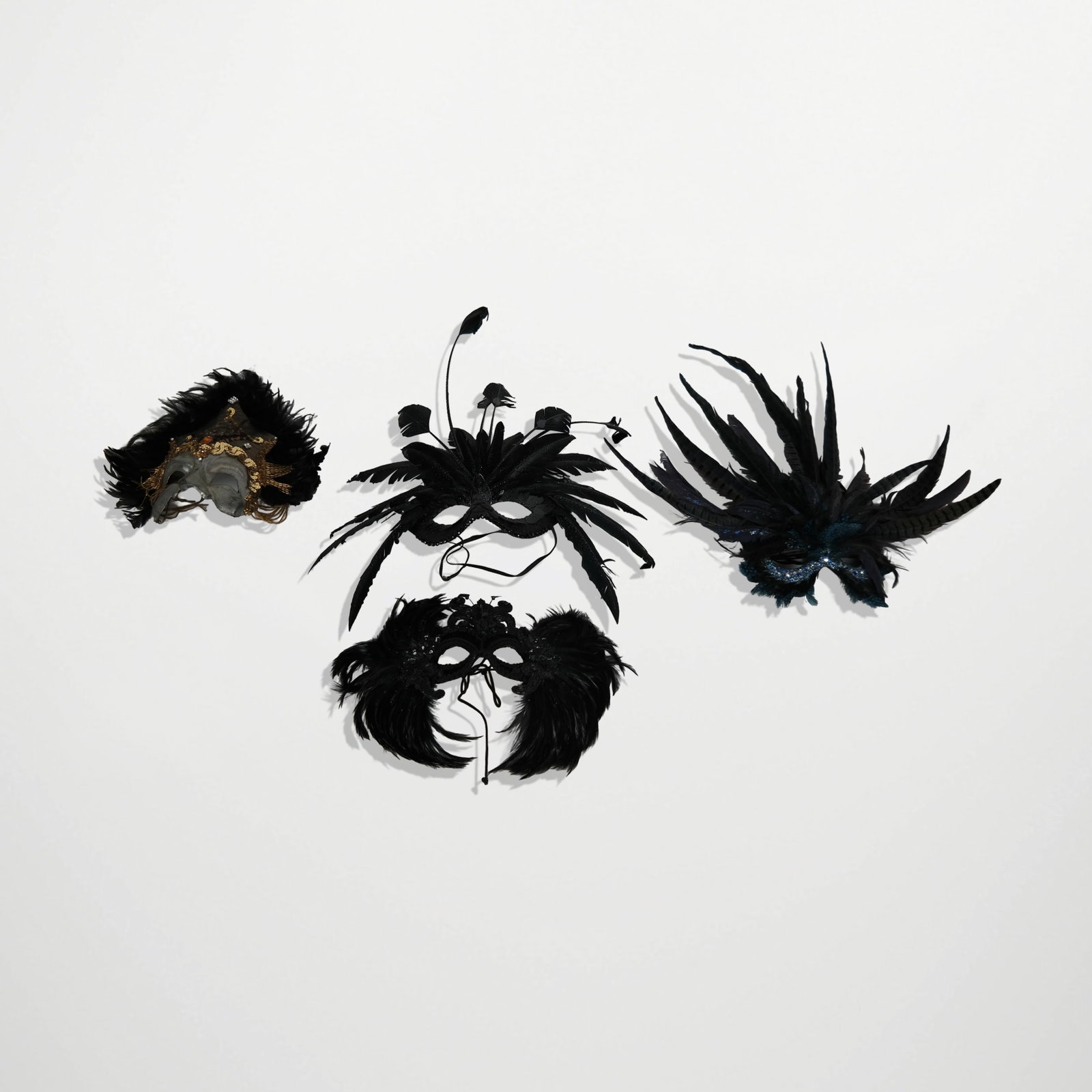 Four Feather Decorated Masks (1 of 14)