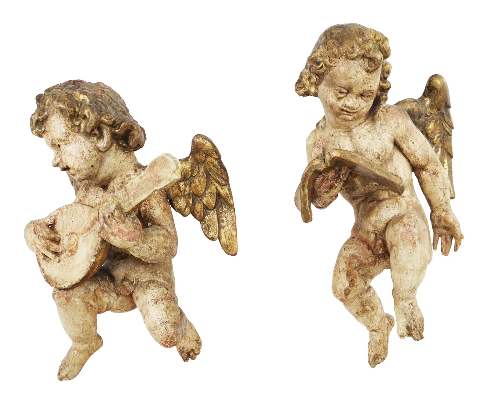 Pair Italian Carved and Gilt Wood Putti: Pair of Italian gilt and carved woof winged putti, 18th century, including a putto with a book, the other with a mandoline, with gilt details to wings and hair. [Larger: 17" H x 9" W x 8" D].