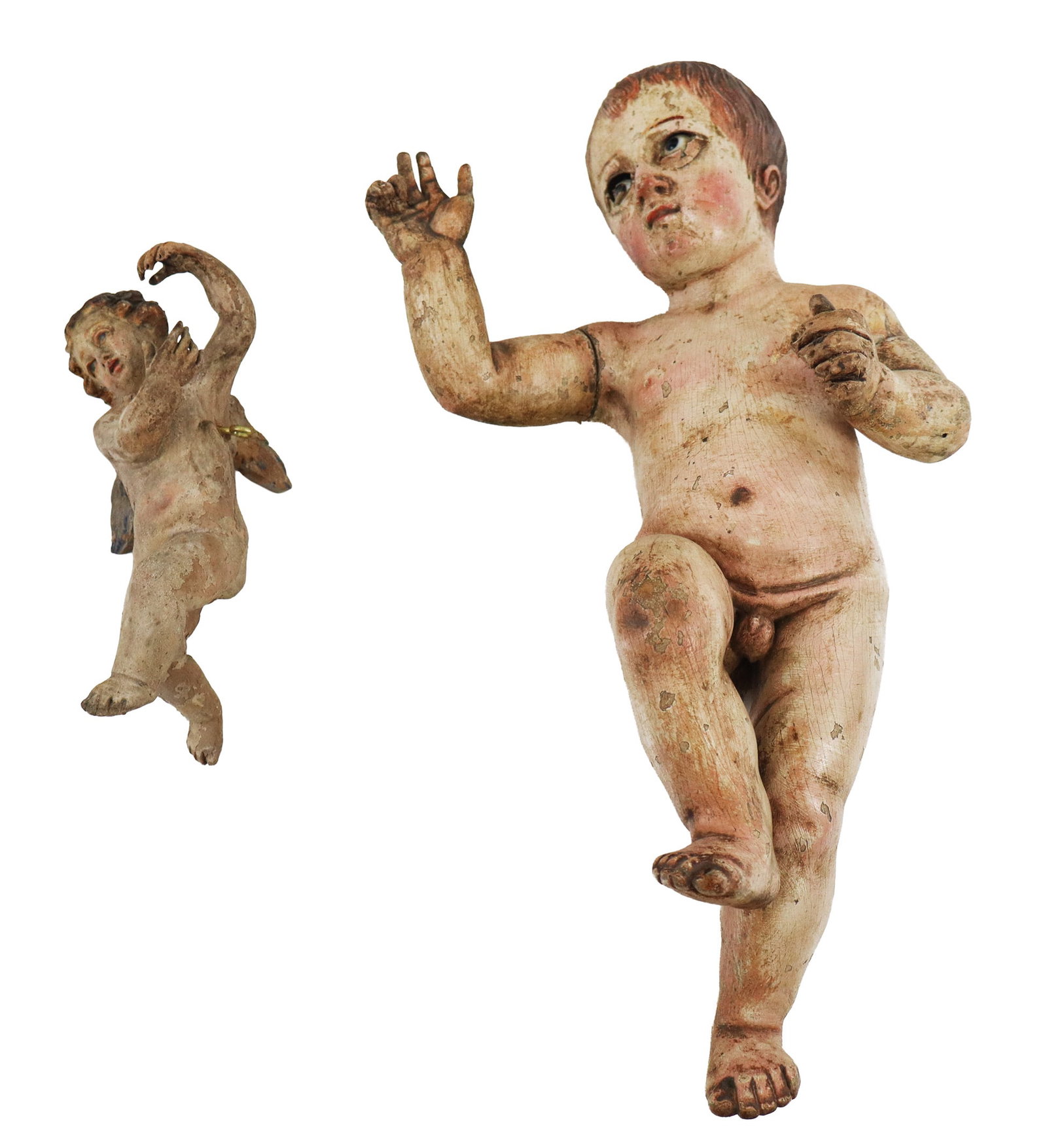 Two Carved Wood Putti: Two carved wood putti, 18th century, comprising a small winged putto with inset glass eyes, and another putto with inset glass eyes. [Larger: 14.5" H x 8" W x 3.5" D]. Condition to each is good,
