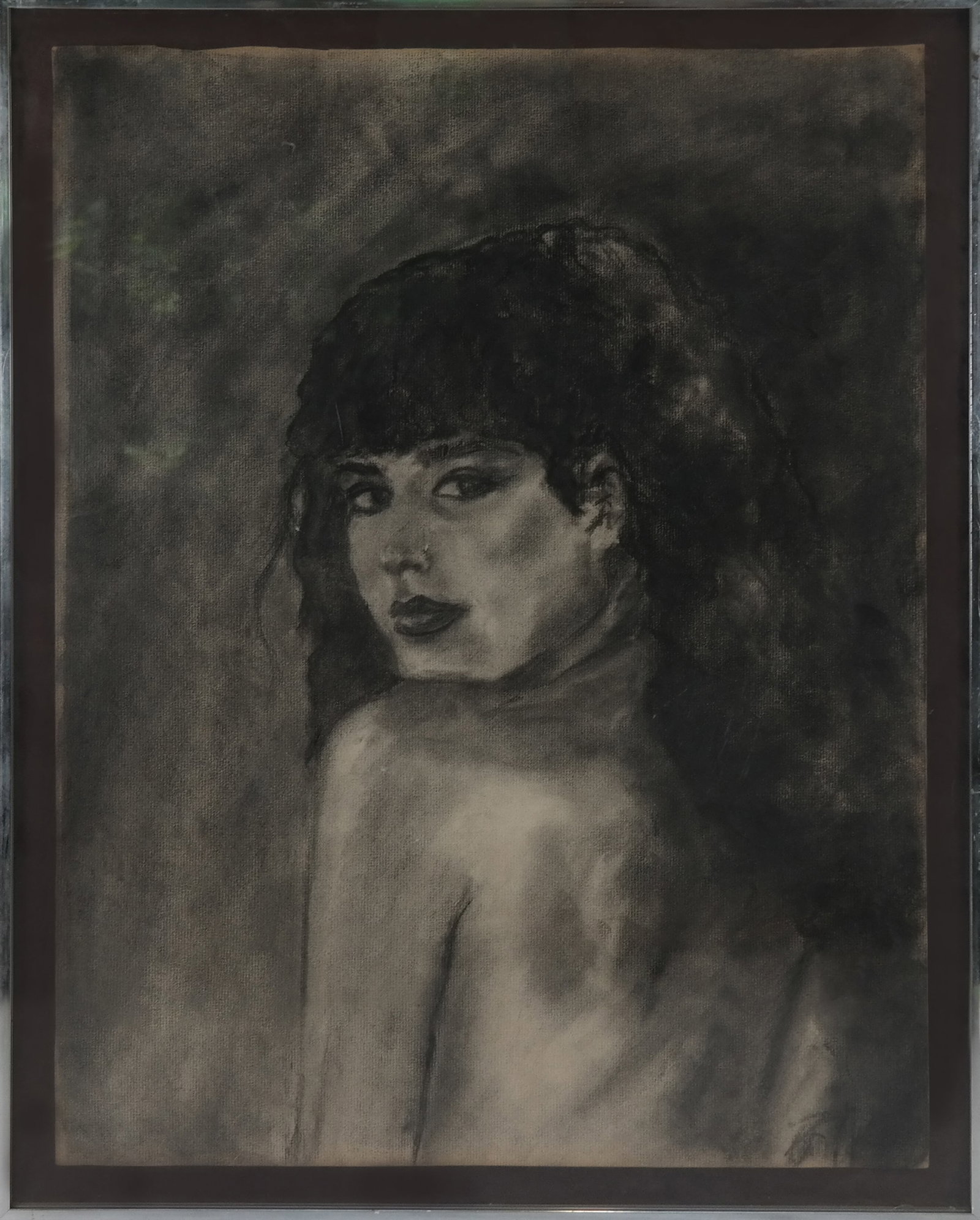 Signed Illegibly Charcoal Study of a Woman: Signed Illegibly, Charcoal study of a woman seductively looking over her bare shoulder. Signed lower right. [23" H x 18" W; 26" H x 20" W]. Good condition, crack in glass.