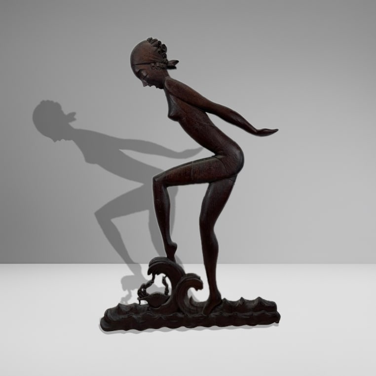 Art Deco Carved Wood Female Figure: Art Deco carved wood female figure, 1st half 20th century. Depicting a bather over water stepping over a crab, on small waves. Unsigned, as wall mounted art. [68" H x 44" W]. Very good condition, slig