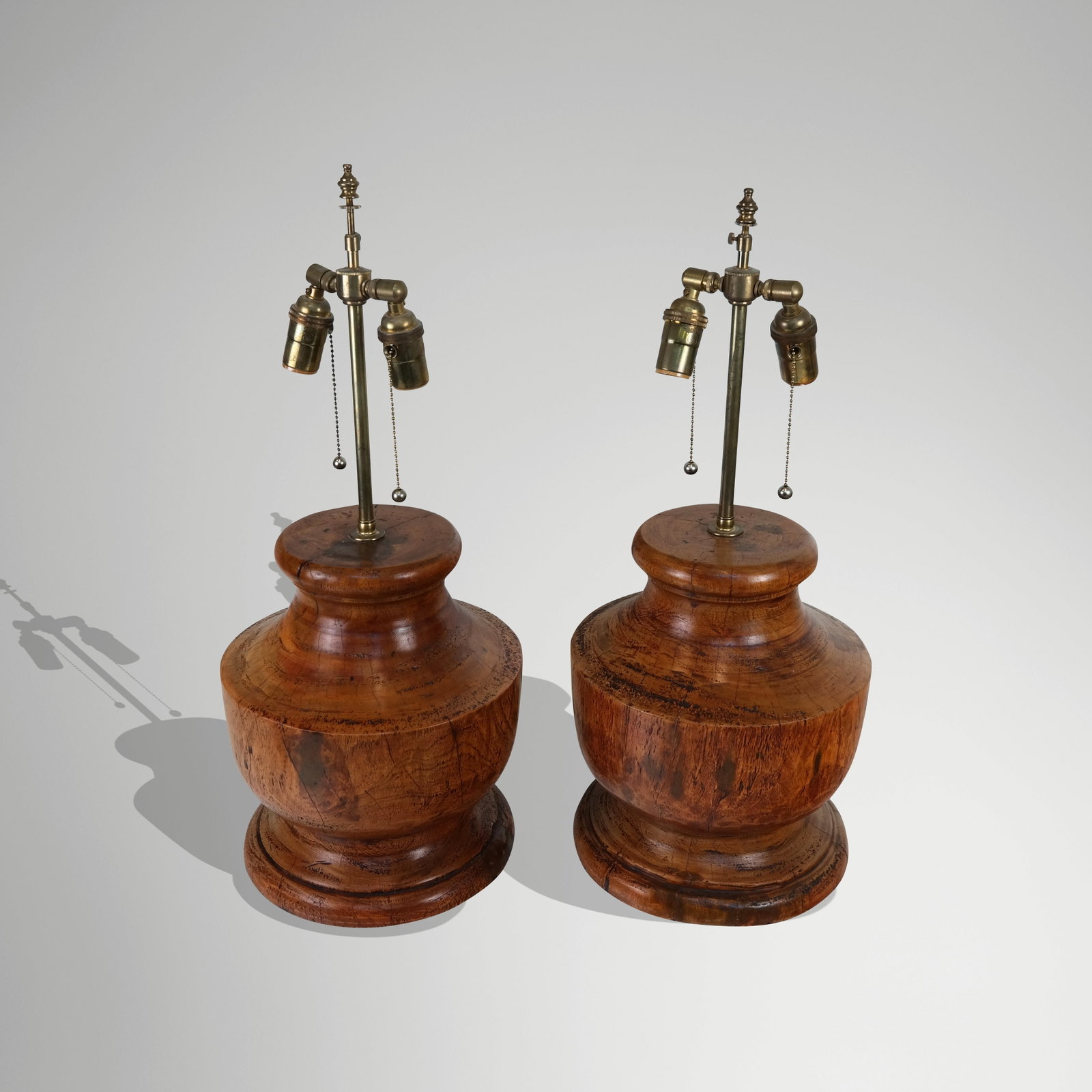 Modern Large Wood Baluster Form Lamp - Pair: Modern large wood baluster form lamp Pair, antiqued look, late 20th century. [24" H to finial x 11" diameter]. Good condition, faux aged to look worn.