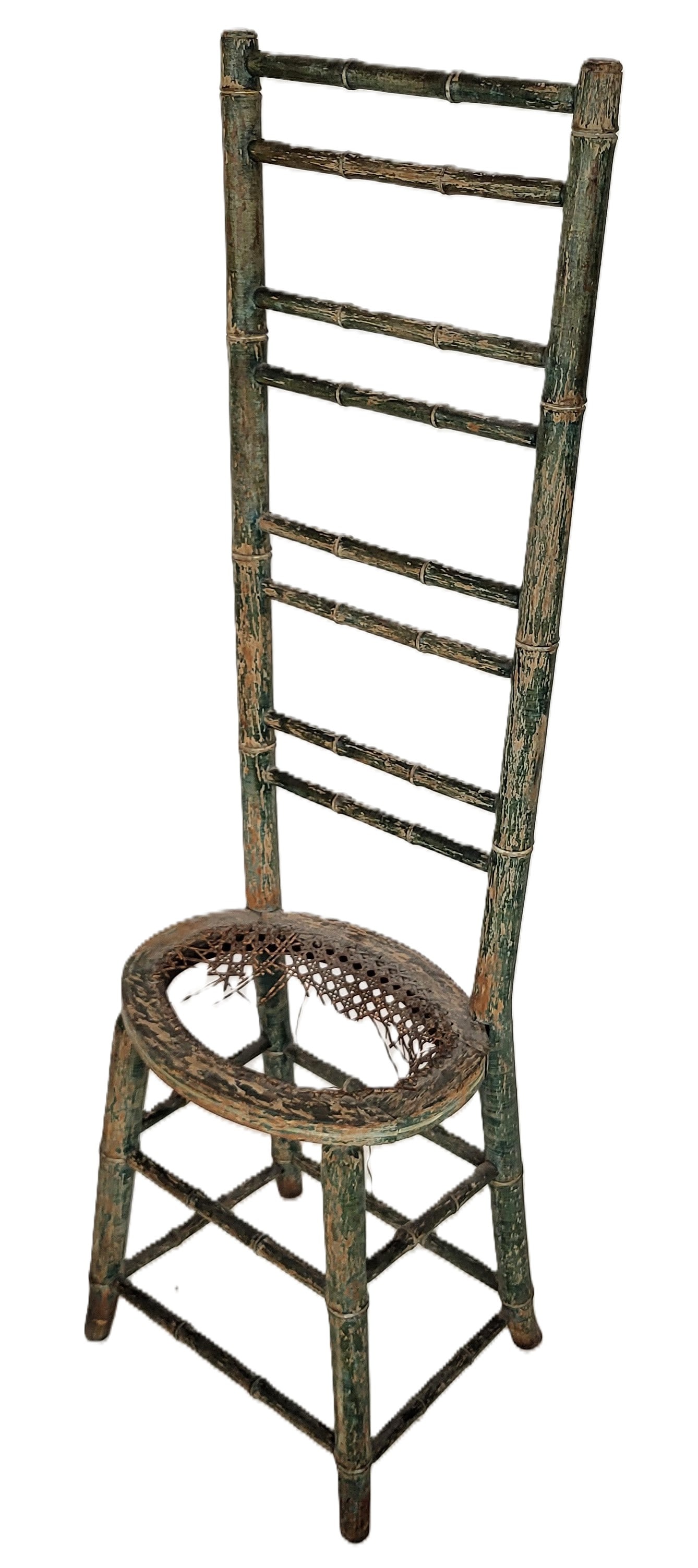 Faux Bamboo Ladderback Chair: Faux bamboo ladderback chair, 19th century, with green painted frame and a caned seat. [33" H x 12.5" W x 11" D; seat height: 16"]. Condition is good to fair with surface wear and losses to caning at 