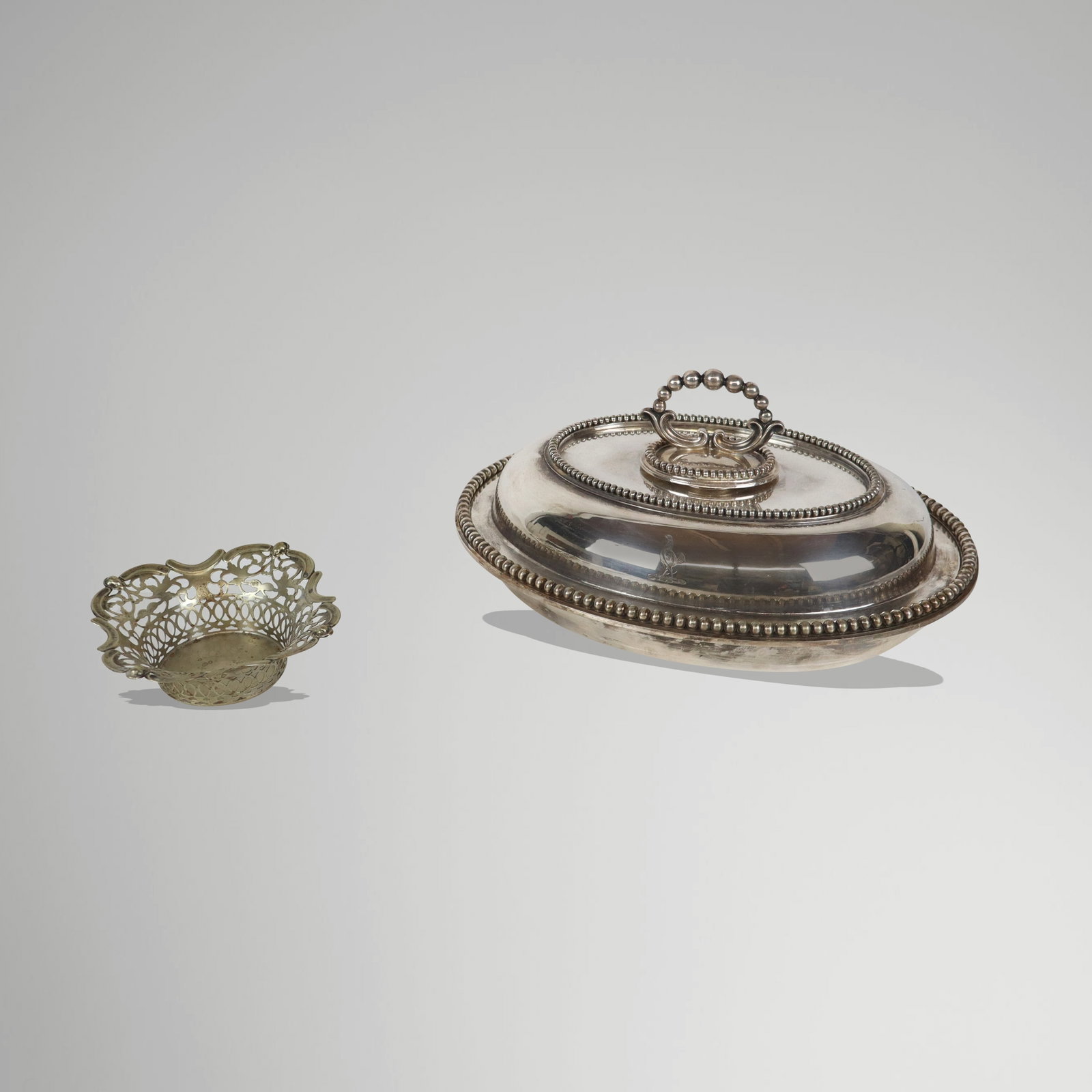 Two silver plate table wares, comprising a covered vegetable dish with beaded trim [5" H x 11.5" L x (1 of 10)