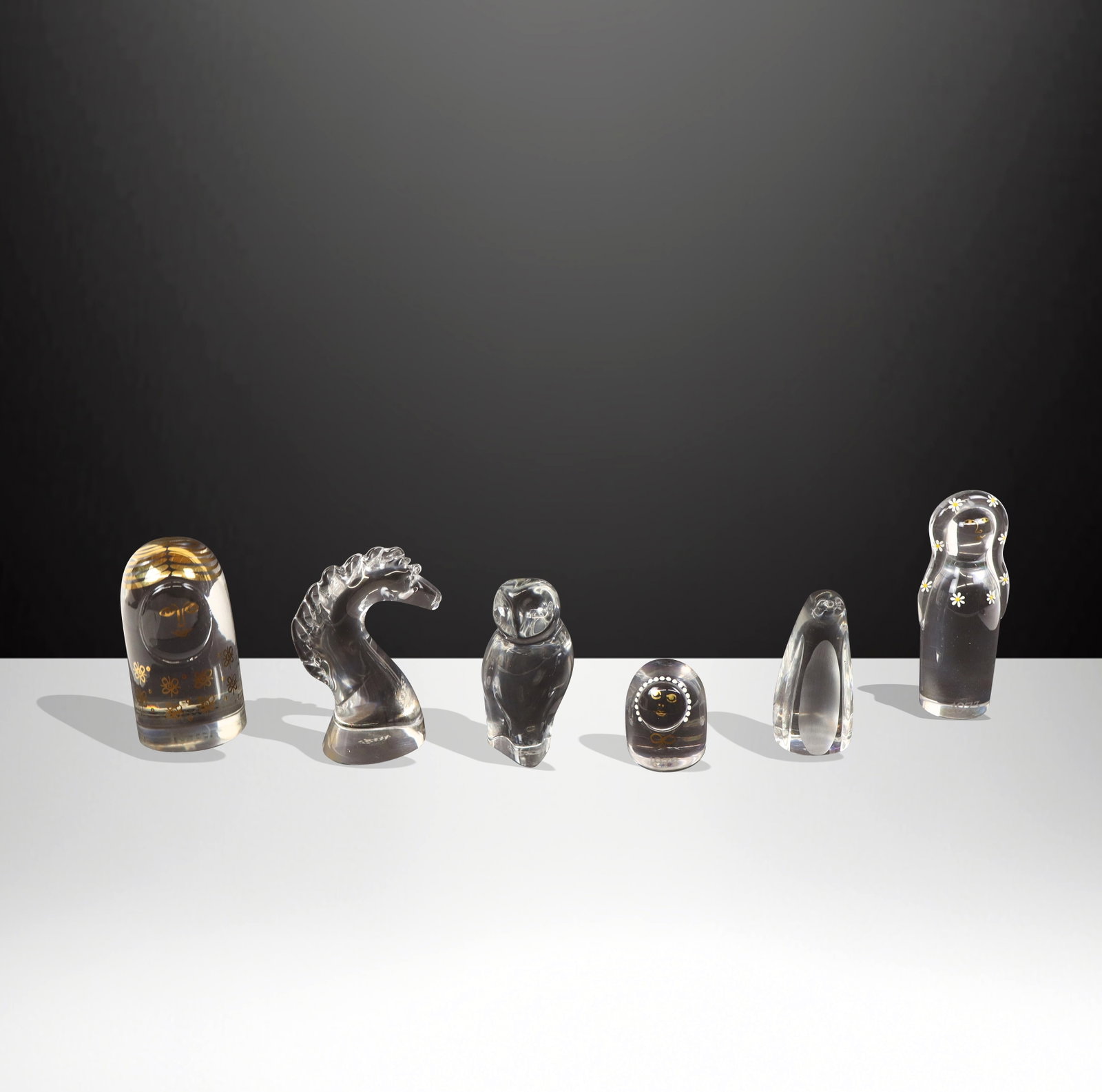 Baccarat, Spode & Kosta Glass Figures, 6: Collection of glass and crystal figures, comprising a Baccarat owl [4.25" H x 2" W x 1.75" D], three Kosta gilt decorated figures "Lisa", "Missy", and "Mor" [Tallest: 5.25" H x 2" W x 1.5" D], and two